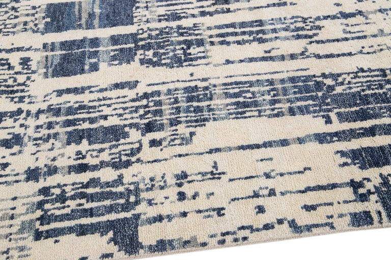 Contemporary Texture Handmade Ivory and Blue Abstract Wool Rug For Sale