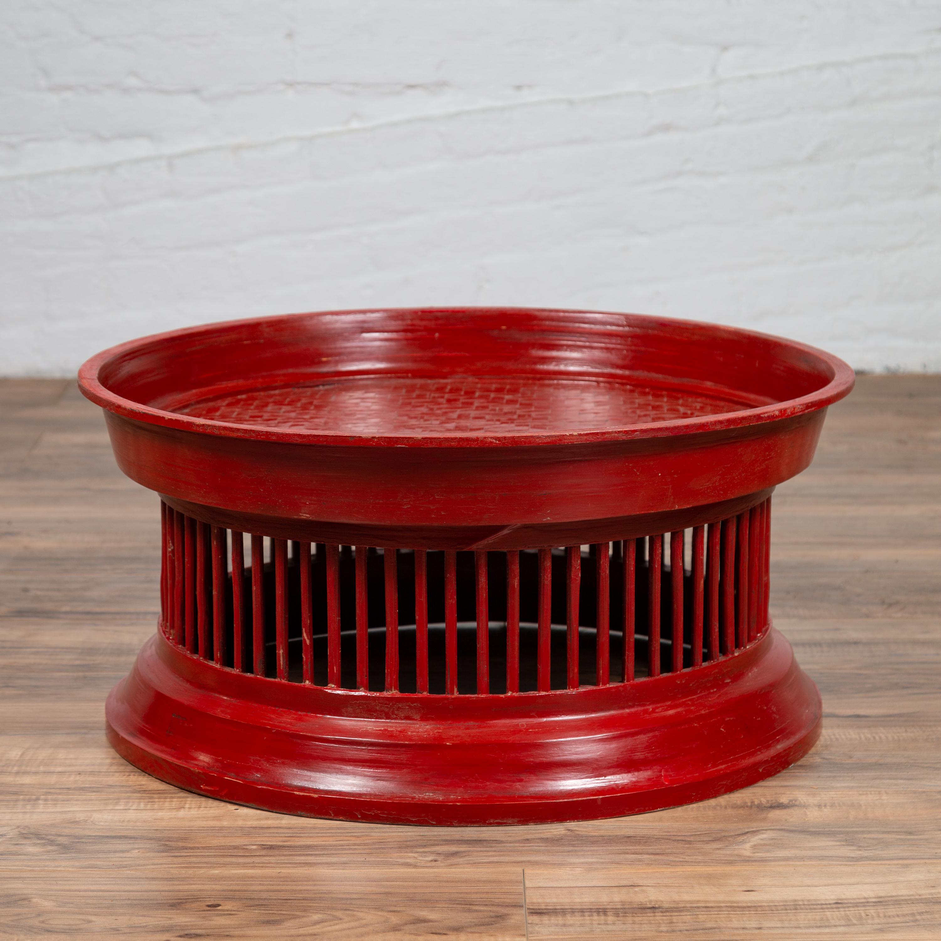 Contemporary Thai Red Lacquered Rattan Drum Coffee Table with Spindle Motifs In Good Condition In Yonkers, NY