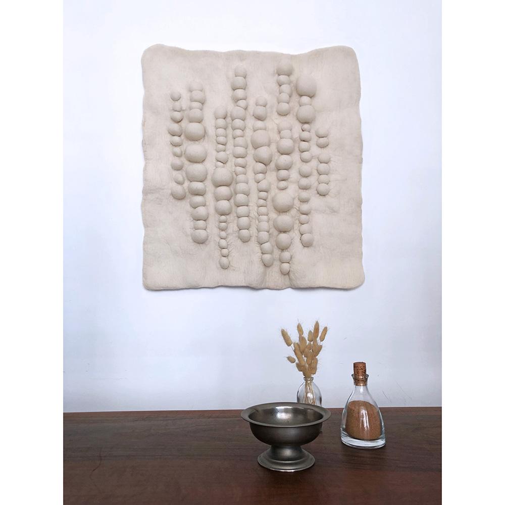 Astra Collection is a contemporary three-dimensional felt wall hanging collection inspired by the Mesopotamian cultural heritage and aesthetics of the city of Harran. Harran is a five thousand year old ancient upper Mesopotamian city in the