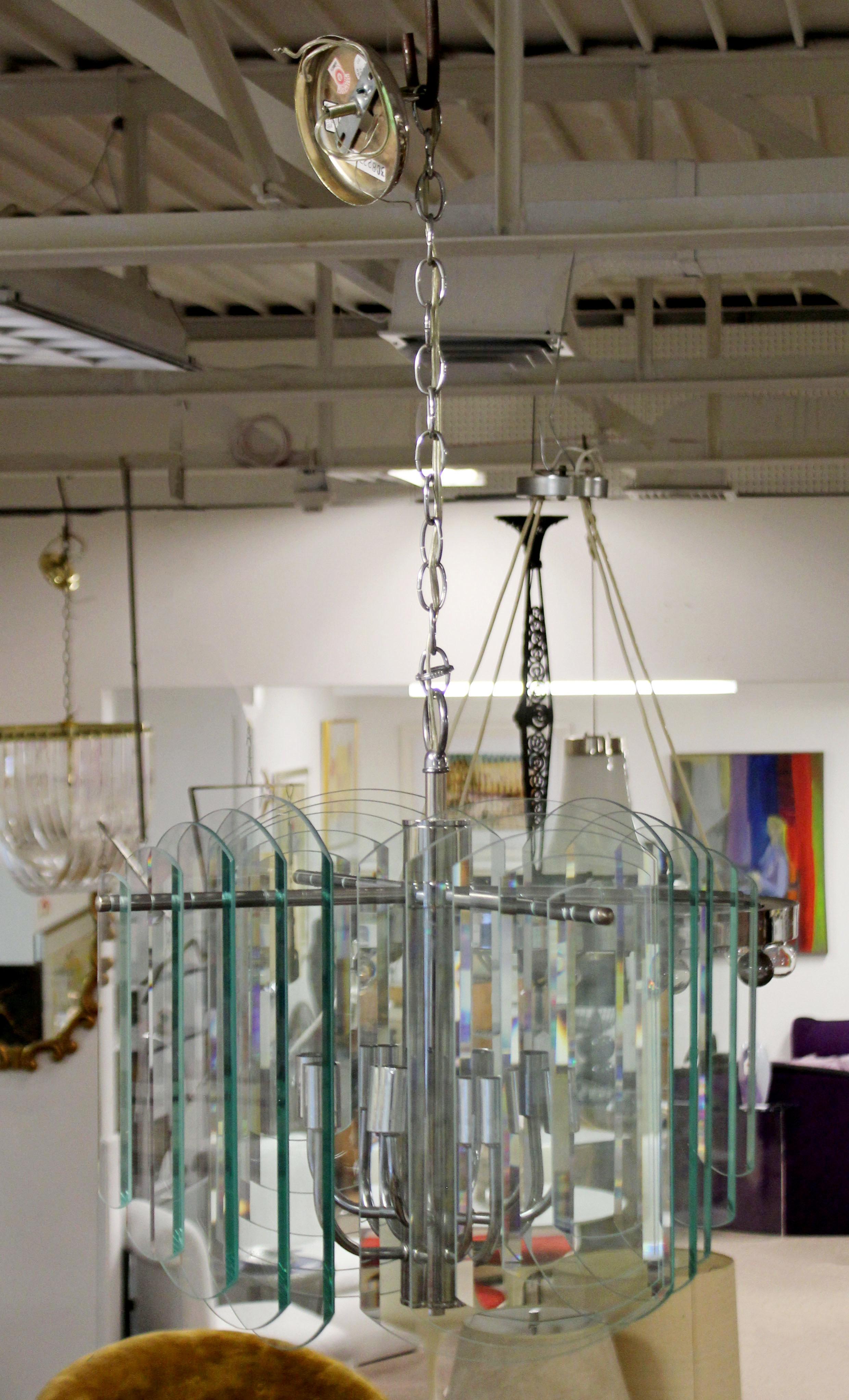 American Contemporary Tiered Glass and Chrome Chandelier by Forecast Lighting Co., 1980s For Sale