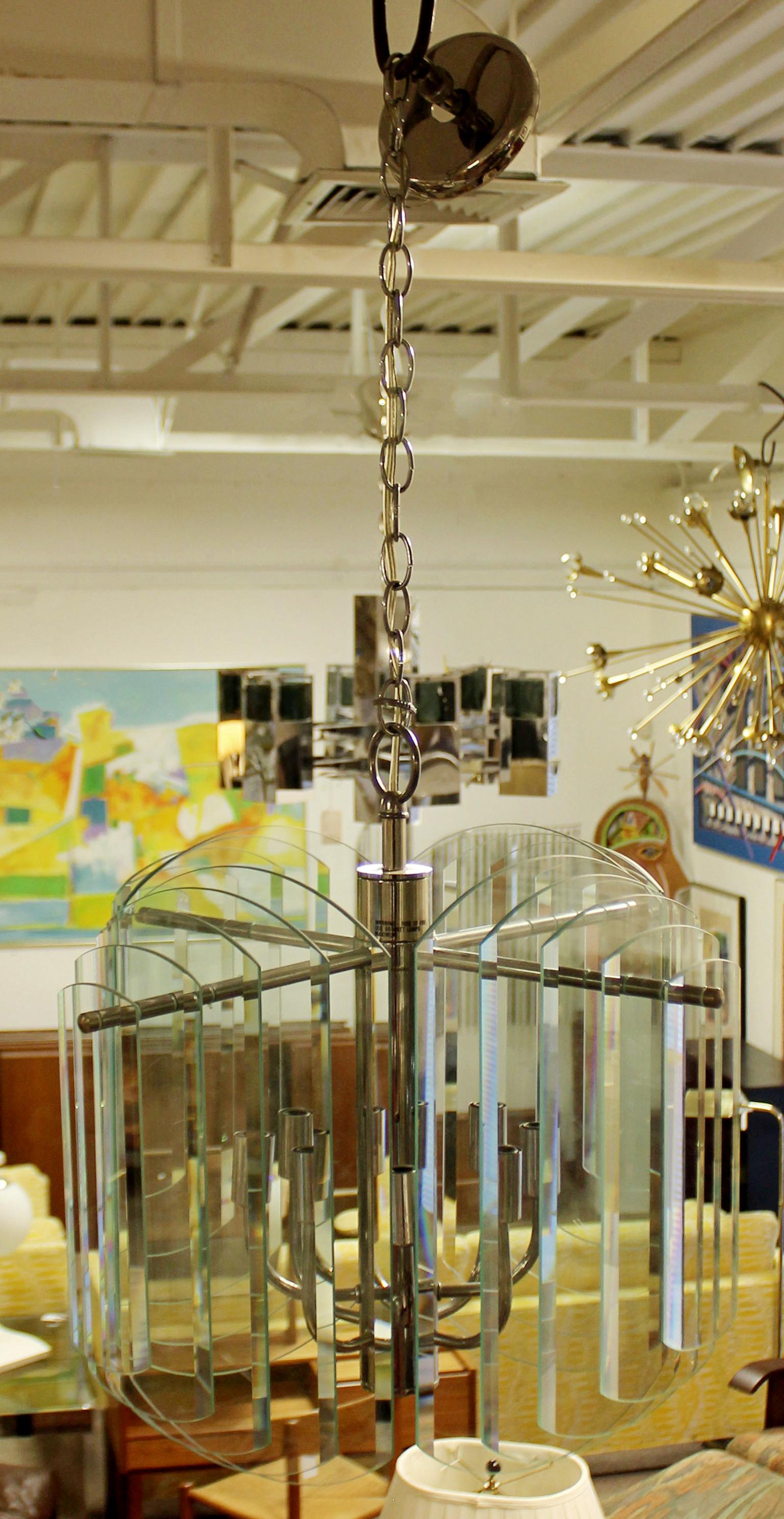 Contemporary Tiered Glass and Chrome Chandelier by Forecast Lighting Co., 1980s In Good Condition For Sale In Keego Harbor, MI