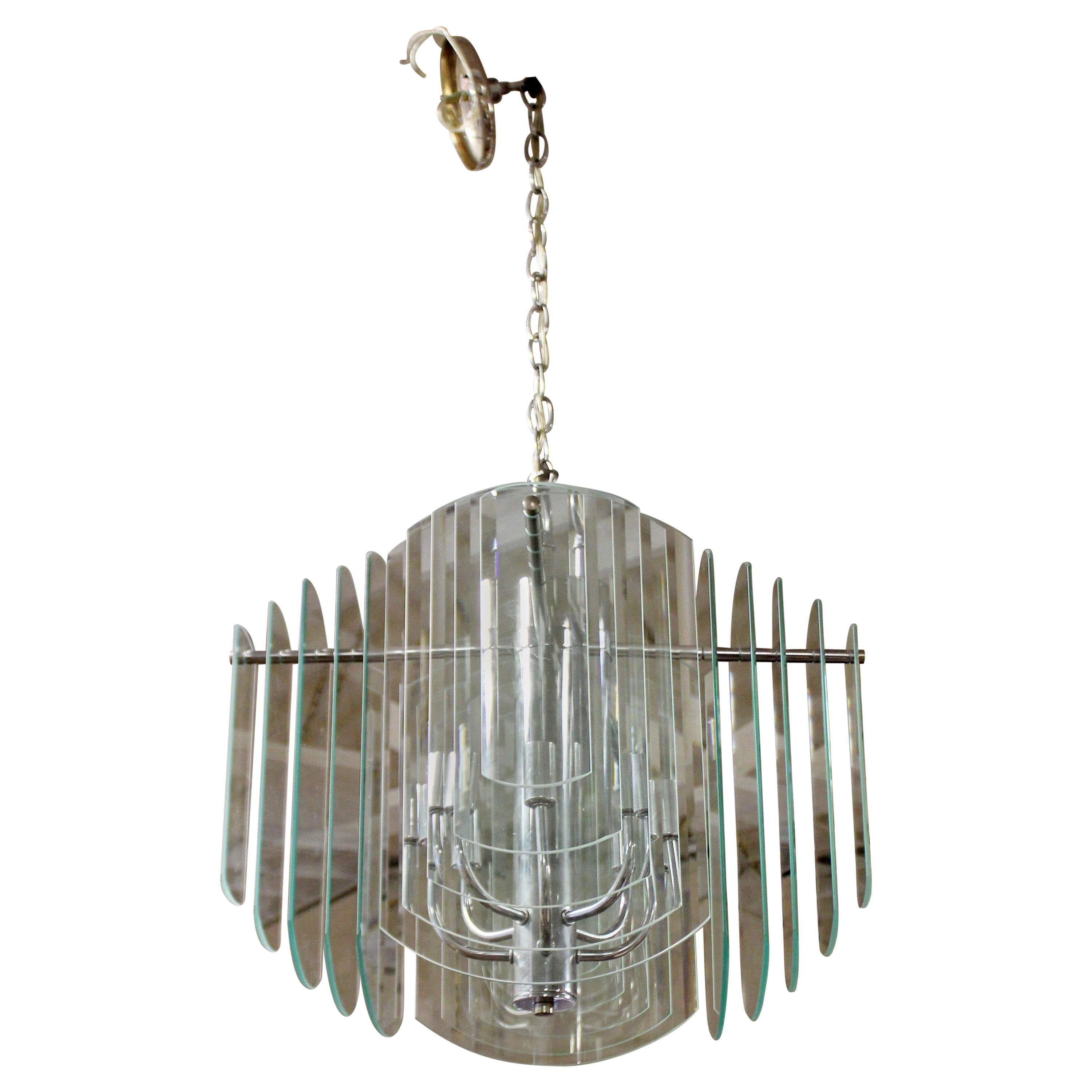 Contemporary Tiered Glass and Chrome Chandelier by Luminaire, 1980s