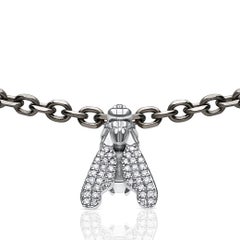Contemporary Titanium Bracelet with 18K White Gold Diamond Fly Motif