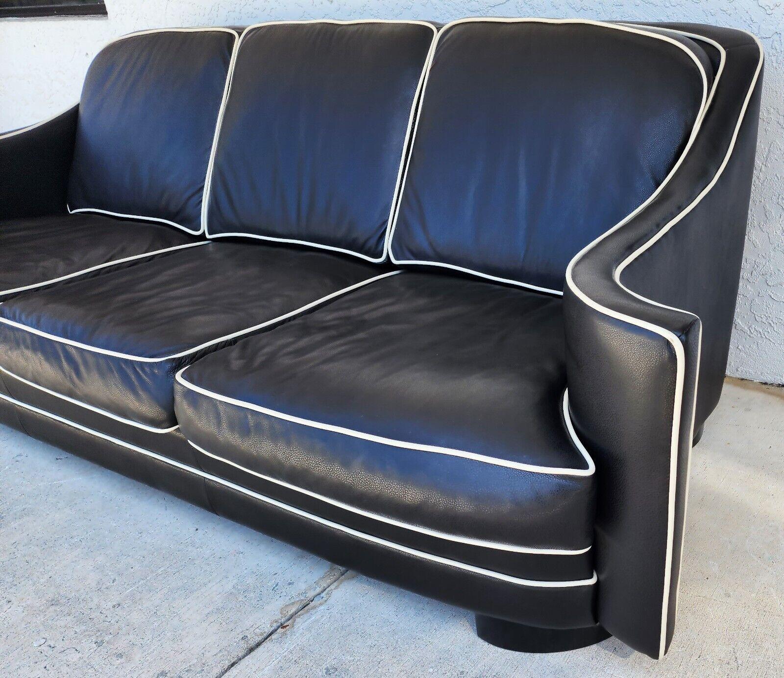 For FULL item description click on CONTINUE READING at the bottom of this page.

Offering One Of Our Recent Palm Beach Estate Fine Furniture Acquisitions Of A
Contemporary Top Grade Leather Sofa by of Elite Leather Los Angeles
Very comfortable