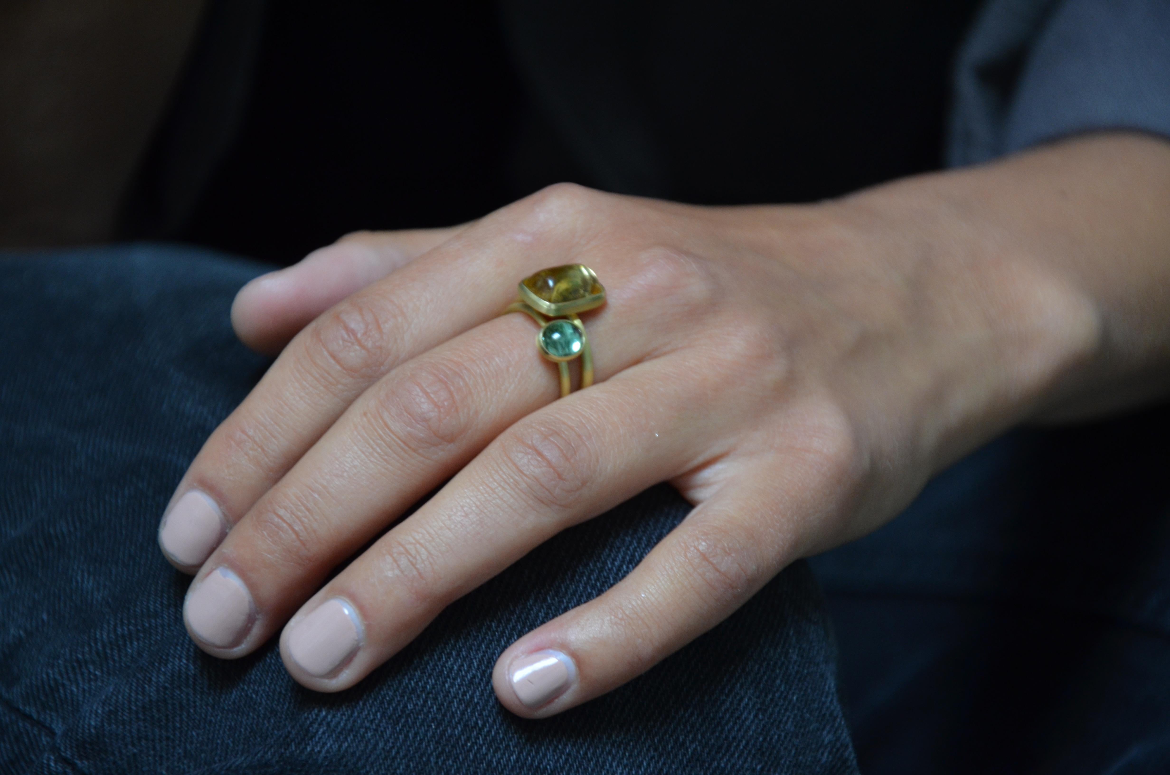 Contemporary Tourmaline 18 karat Gold Cocktail Ring

Minimalist, modern, elegant - handcrafted in our atelier, designed by Lea Schneider.
Unique in its wavey, organic shape this golden ring holds a shiny rose tourmaline. 
Through light hitting the