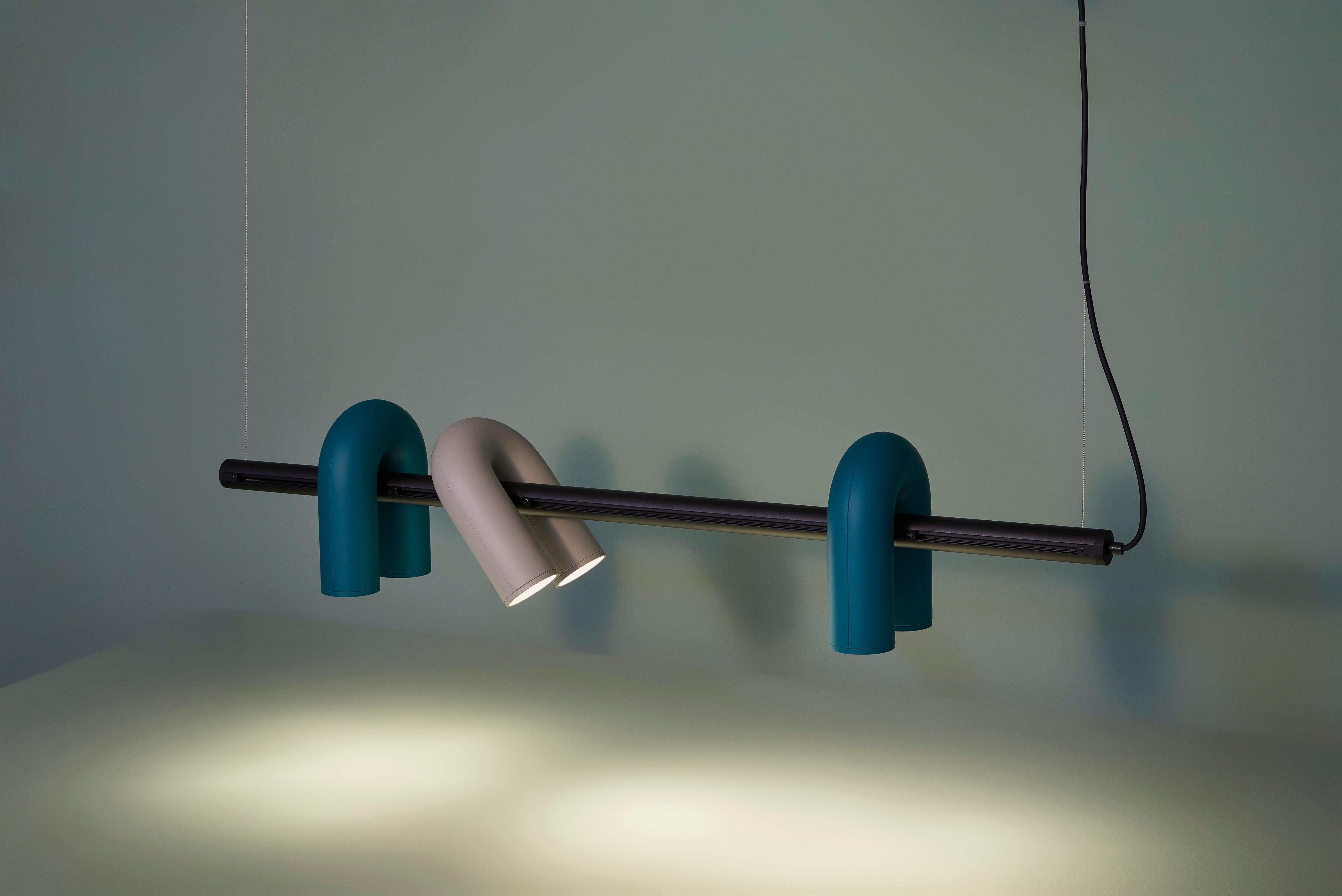 Cirkus track lights by AGO Lighting
Coated ABS, aluminum

UL Listed
LED GU10 110-240V (not included)

Four colors available: Charcoal, grey, green, terracotta
Rail lengths (3 sizes available): 60 x 3 cm / 90 x 3 cm / 120 x 3 cm
Spot size: 18 x 14,8