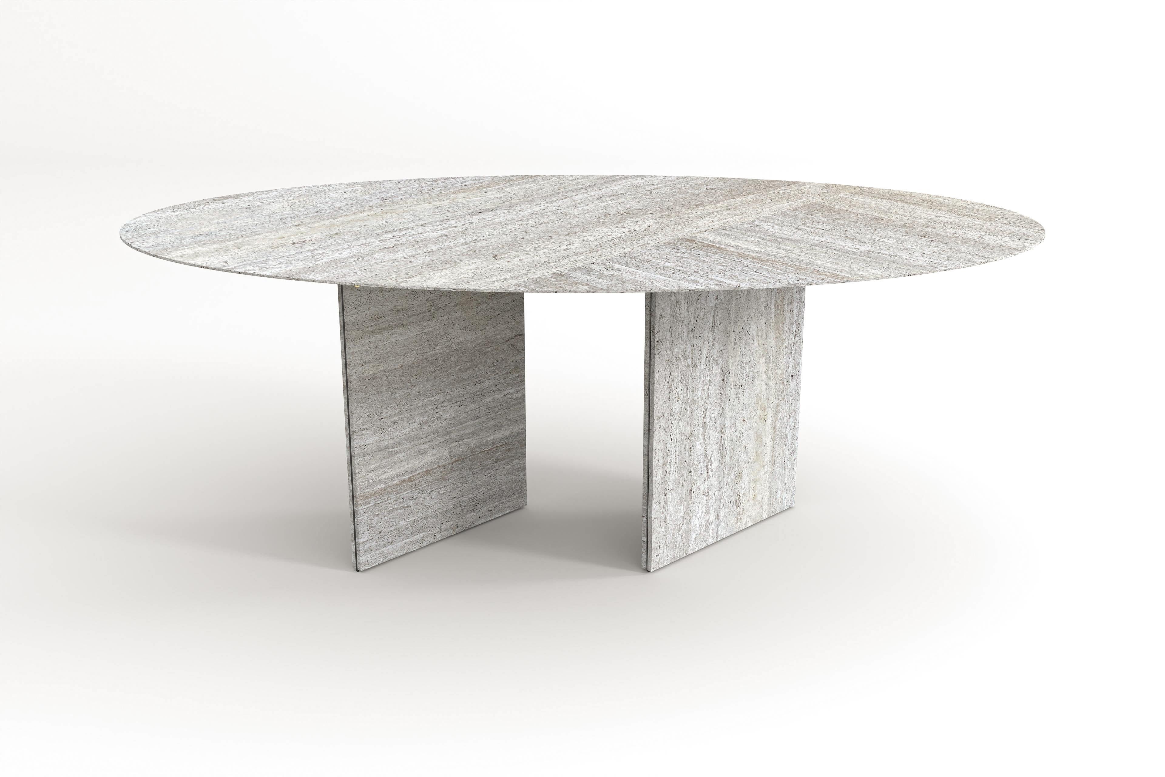 Ellipse 02 is a redesign of our classic ellipse tables. It evolved into a new, intriguing composition without losing the core (shape) of the original. This table just demands to be looked at over and over again. It fascinates by the contrasts of