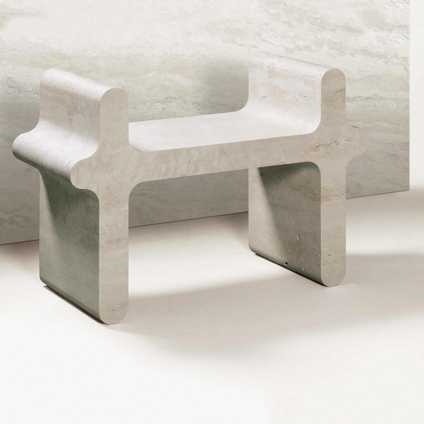Contemporary travertine stool - Ossicle N.1 by Francesco Balzano for Giobagnara.

Part of a superb series of benches, tables, and seats inspired by the soft yet monumental lines that make up the pieces of Ancient Greek and Roman game 