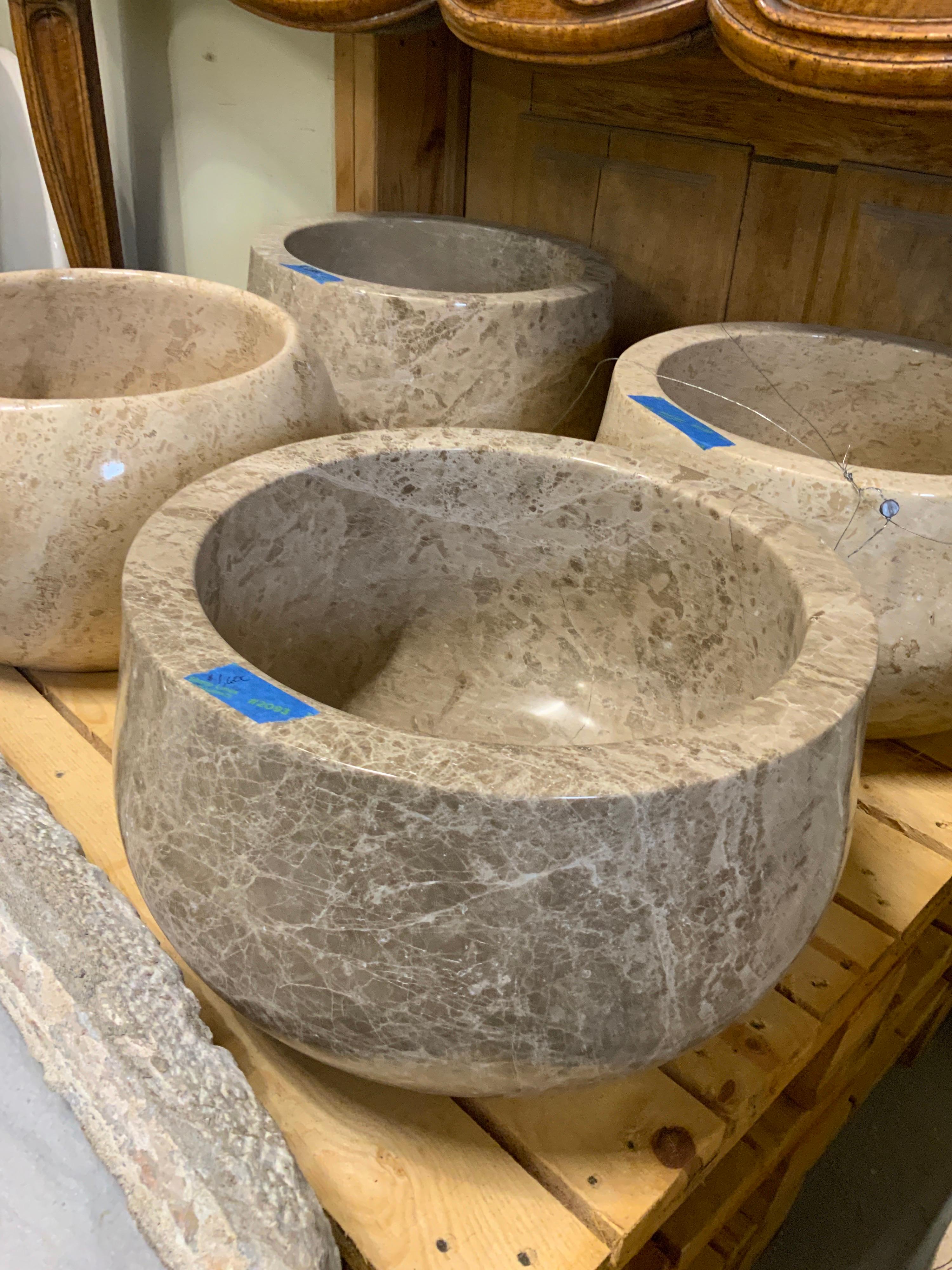 This gorgeous sink is composed of Travertino Marble. Item features Taupe color throughout with brown accent.