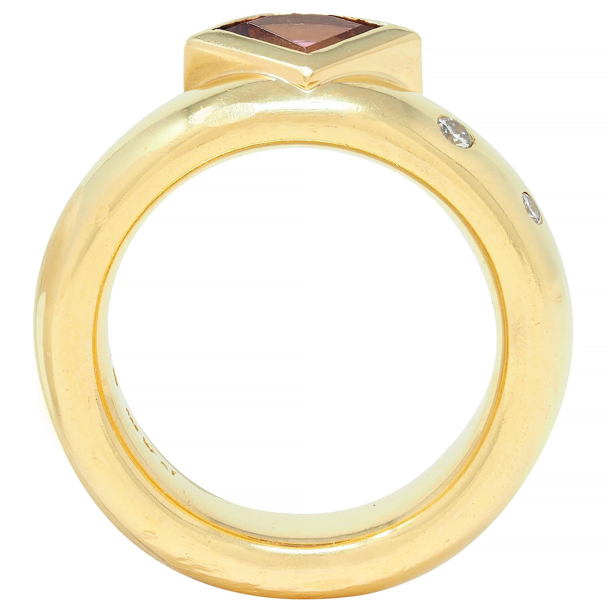Centering a triangular-shaped mixed-cut topaz - transparent medium pink
Bezel set partially down band with flush set diamonds
Weighing 0.06 carat total - eye clean and bright
Scattered abstractly to one side of topaz
With high polish