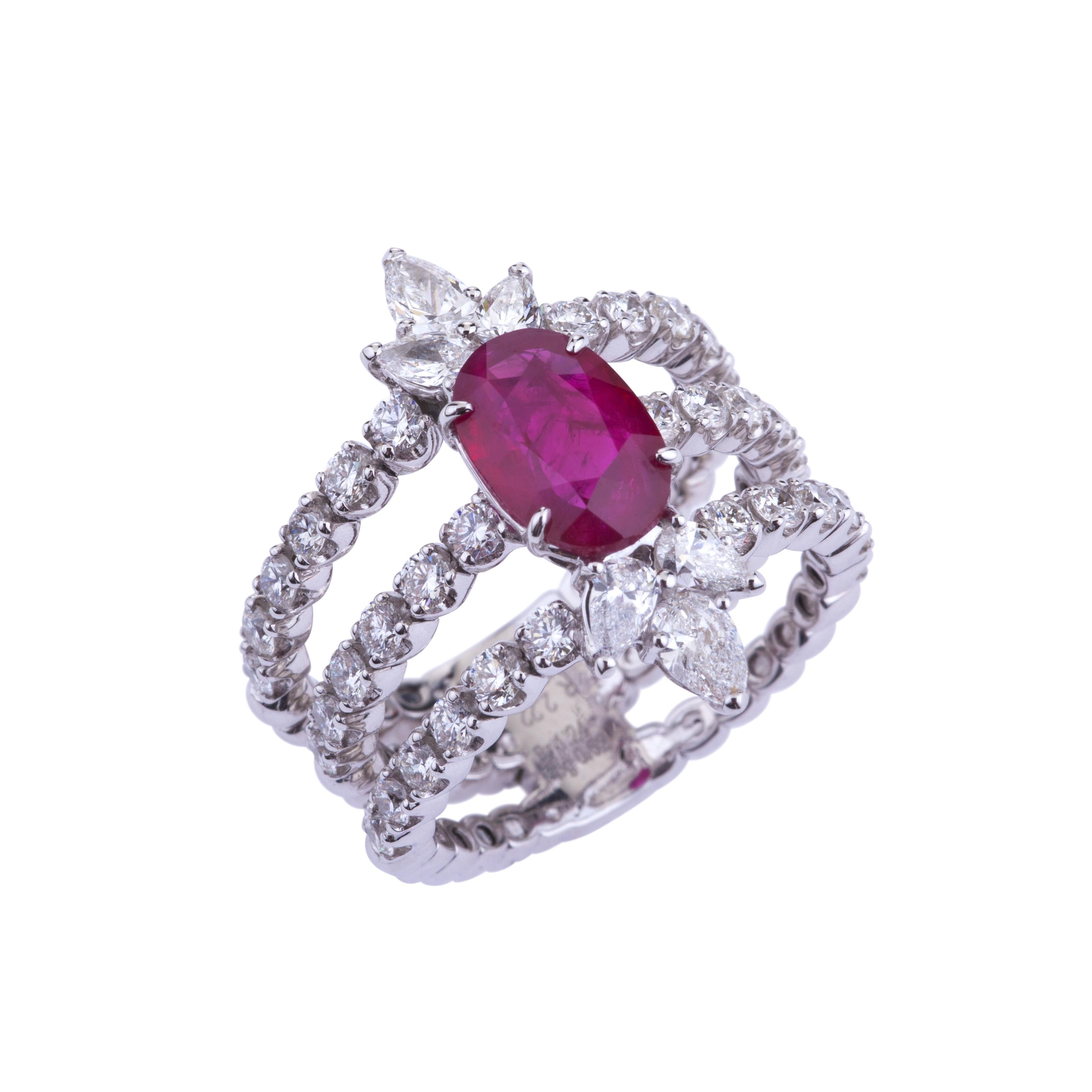 Contemporary Triple Ring with Diamonds and Burma Ruby with Certificate GRS.
Modern Design for this Ring with a Stunning Oval Ruby (ct. 2.22 Certificate GRS 9.50x6.36x3.82 faceted gemstone vivid red type 