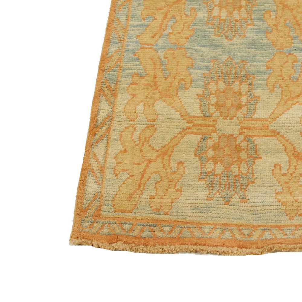 Hand-Woven Contemporary Turkish Donegal Rug with Ivory and Brown Botanical Details For Sale