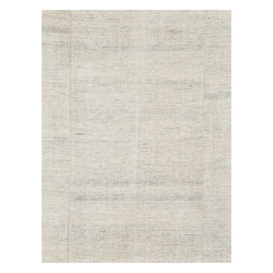 A modern Turkish flat-weave Kilim accent rug in beige tones handmade during the 21st century in the modern farmhouse style.

Measures: 6' 6