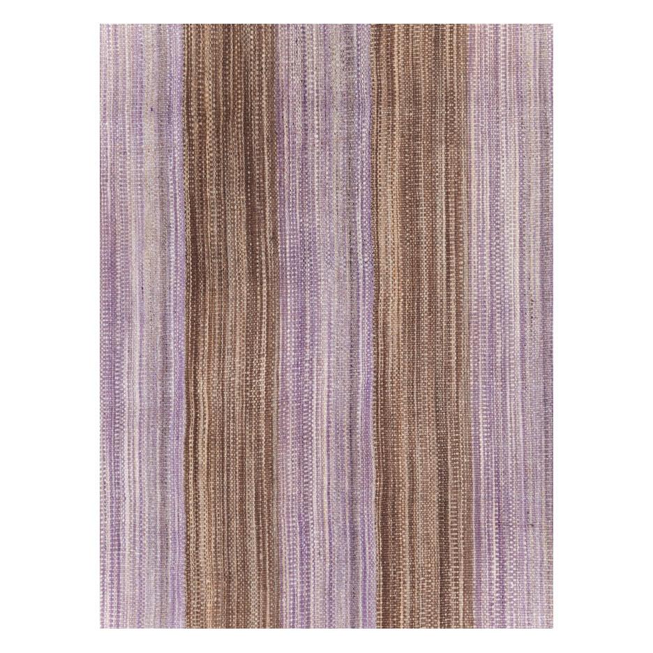 A modern Turkish flatweave Kilim small room size carpet handmade during the 21st century in shades of purple and brown.

Measures: 8' 1