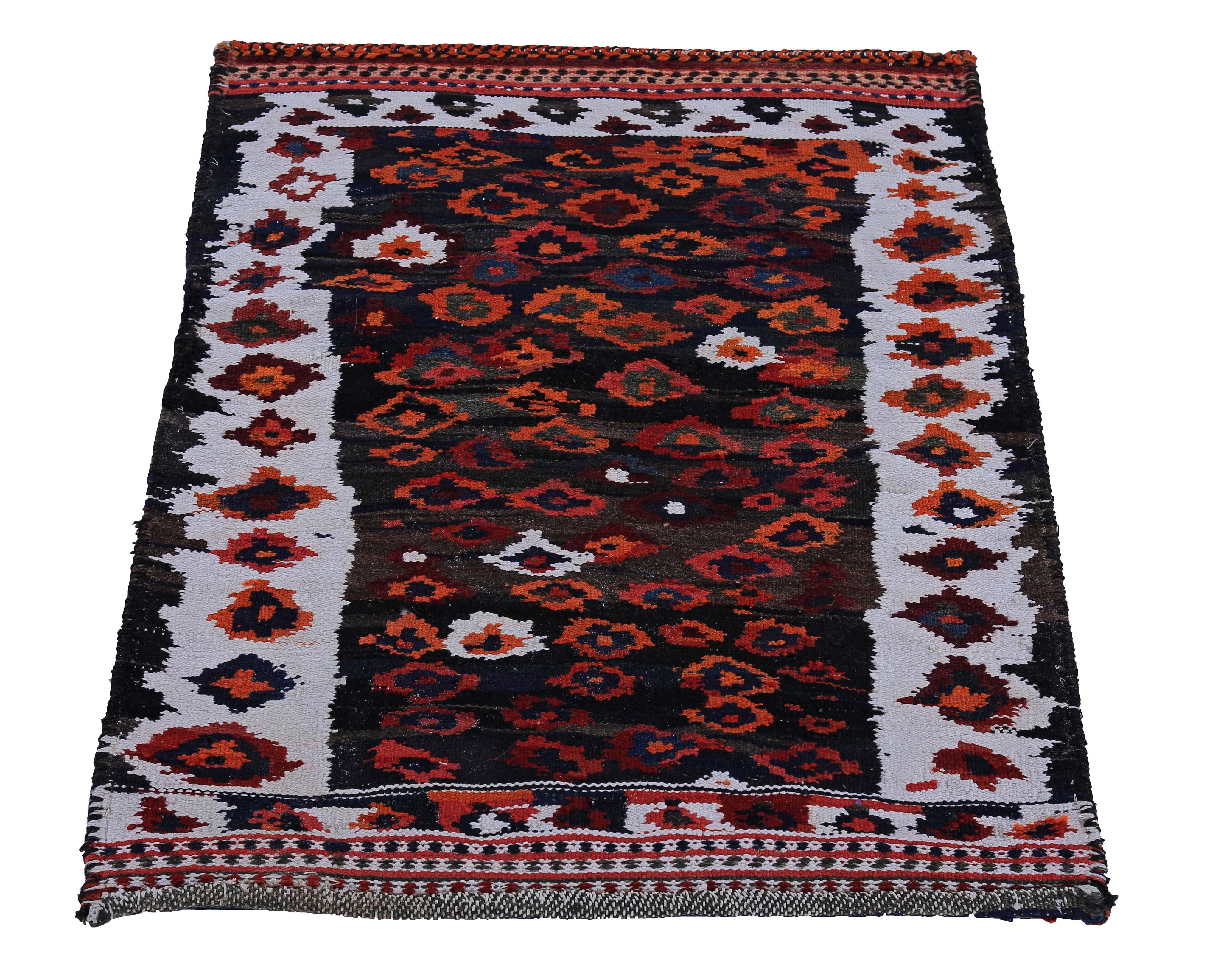 Modern Turkish rug handwoven from the finest sheep’s wool and colored with all-natural vegetable dyes that are safe for humans and pets. It’s a traditional Kilim flat-weave design in orange and red floral pattern. It’s a stunning piece to get for