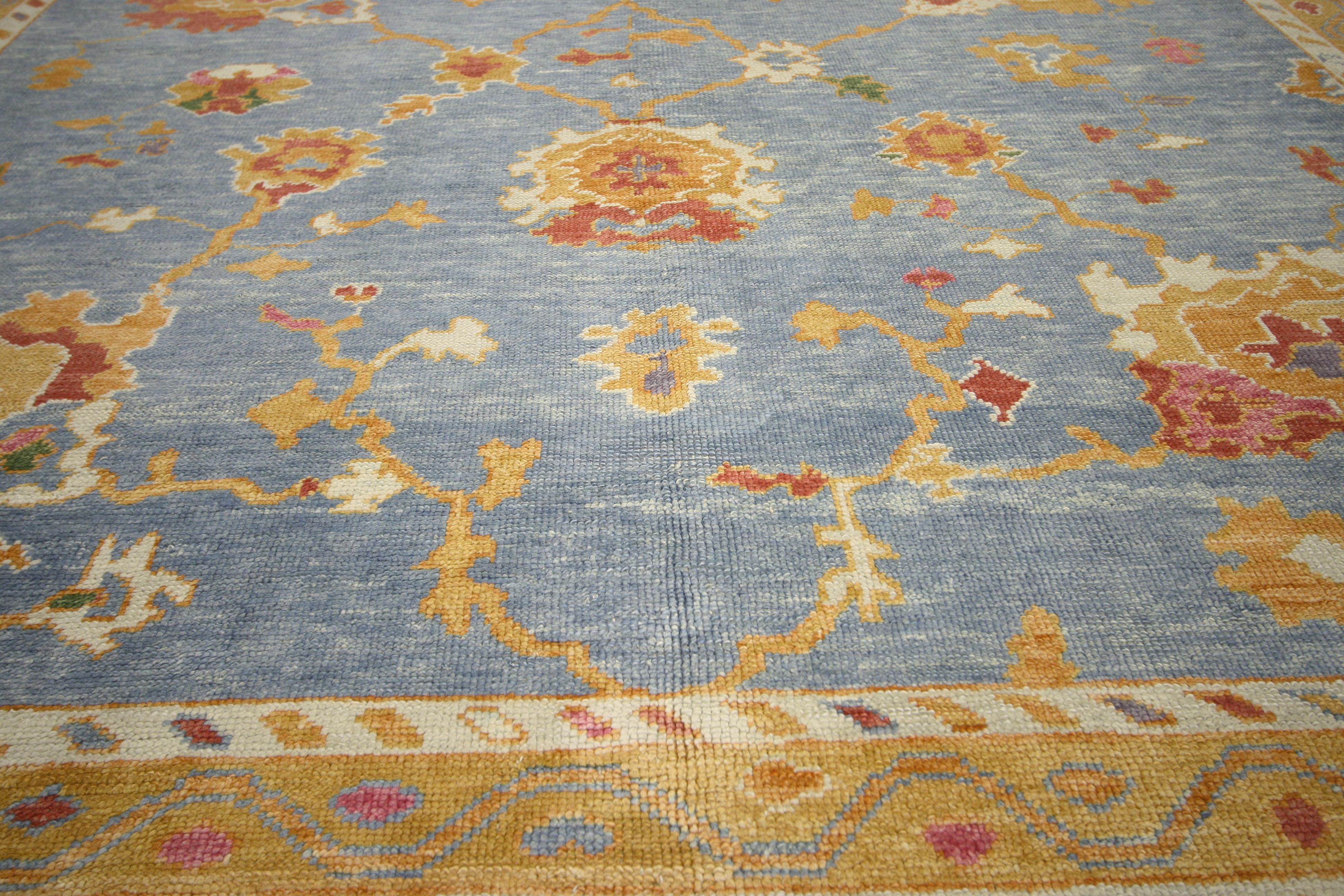 52381, New Contemporary Turkish Oushak Area Rug with Modern Coastal Style. This hand knotted wool contemporary Turkish Oushak rug features a sunny all-over floral pattern spread across an abrashed soft cerulean field. Large expressive palmettes,