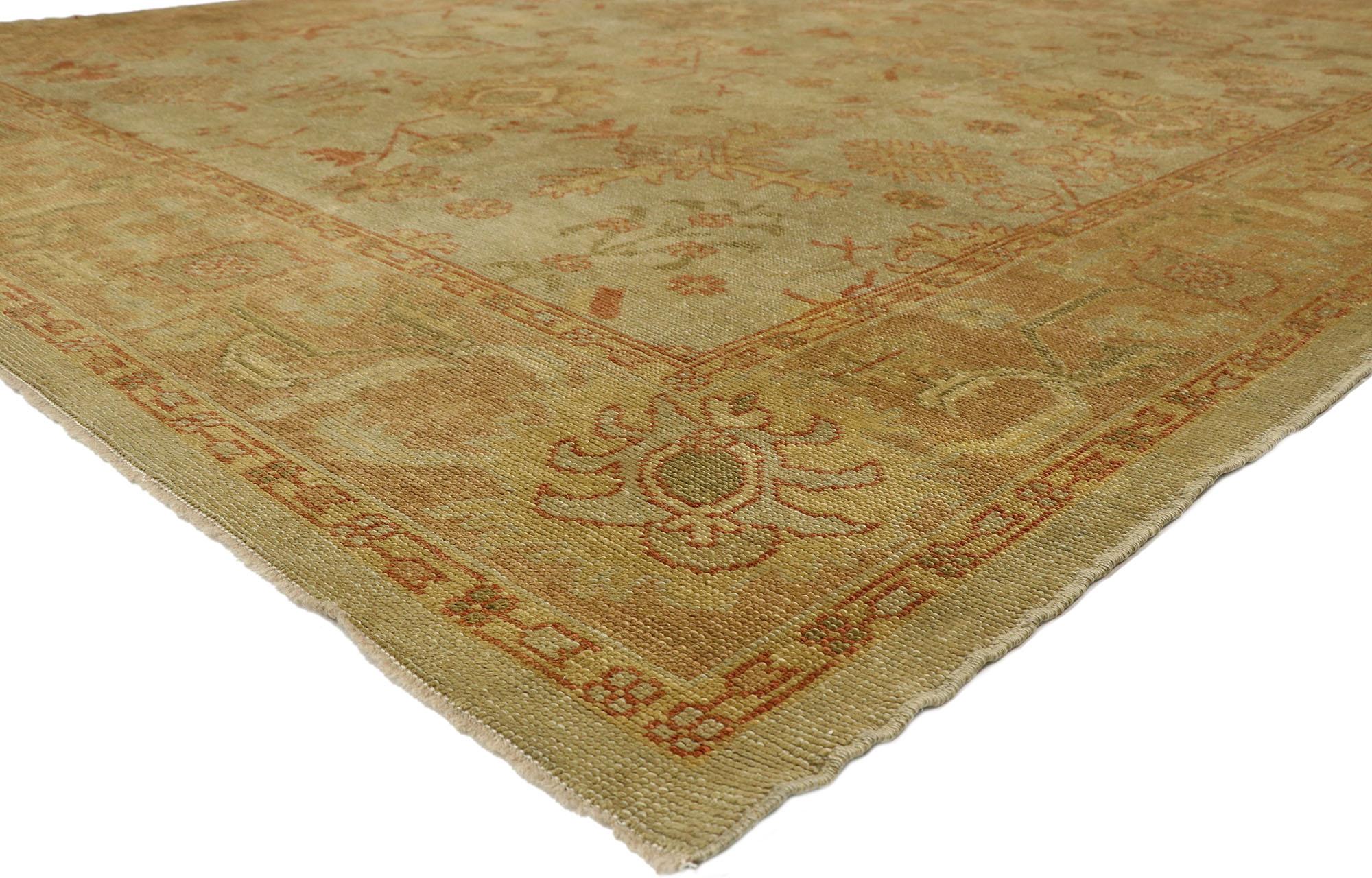 50369 New Contemporary Turkish Oushak Rug with Rustic Arts & Crafts Style 09'02 x 11'07. This hand knotted wool contemporary Turkish Oushak rug features a dynamic all-over floral pattern spread across an abrashed sage field. An array of botanical