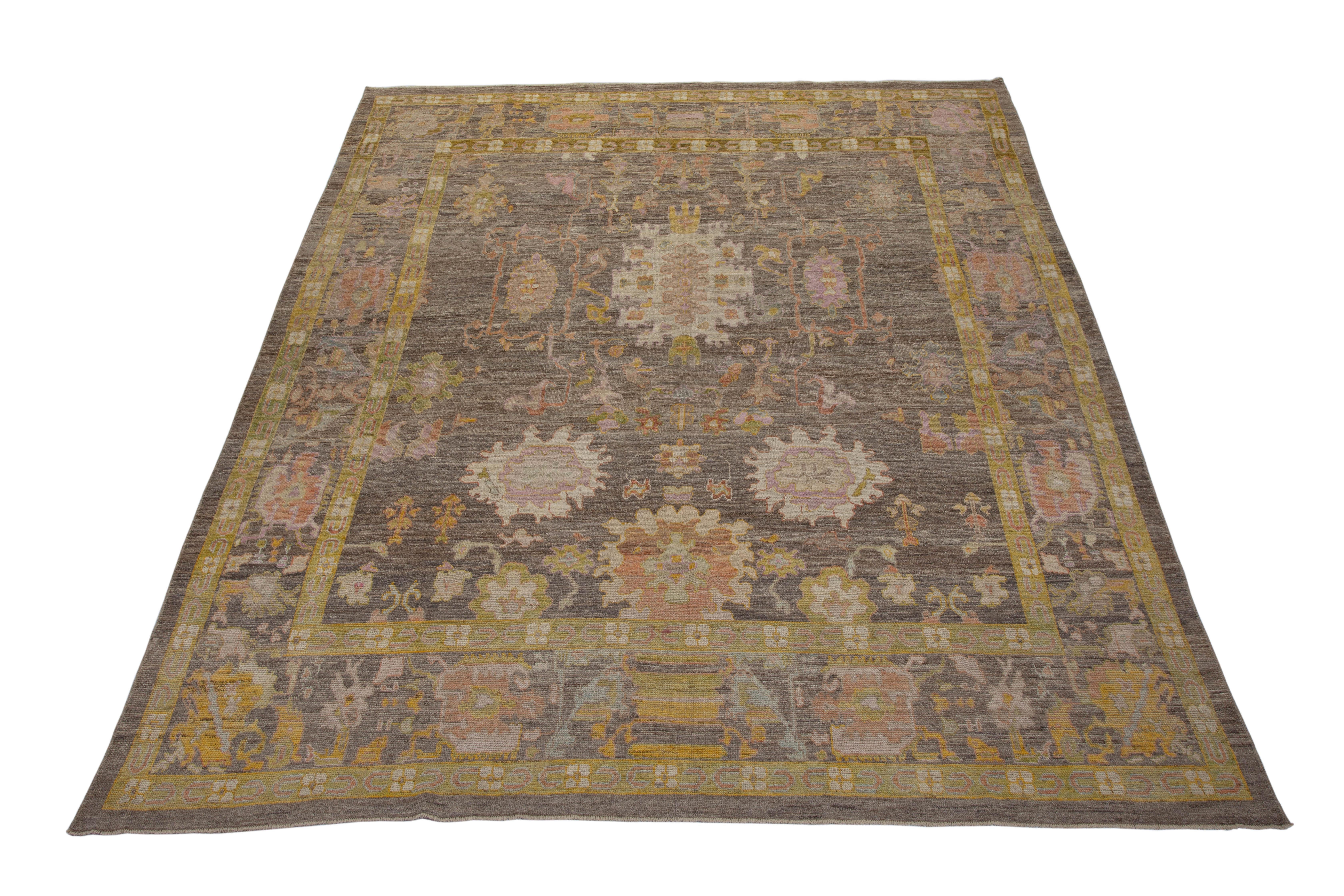 Wool Contemporary Turkish Oushak Rug with a Brown Field and Gold Borders For Sale