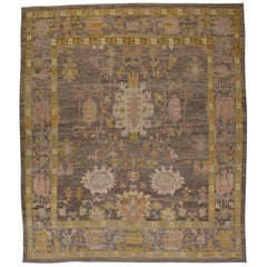 Contemporary Turkish Oushak Rug with a Brown Field and Gold Borders