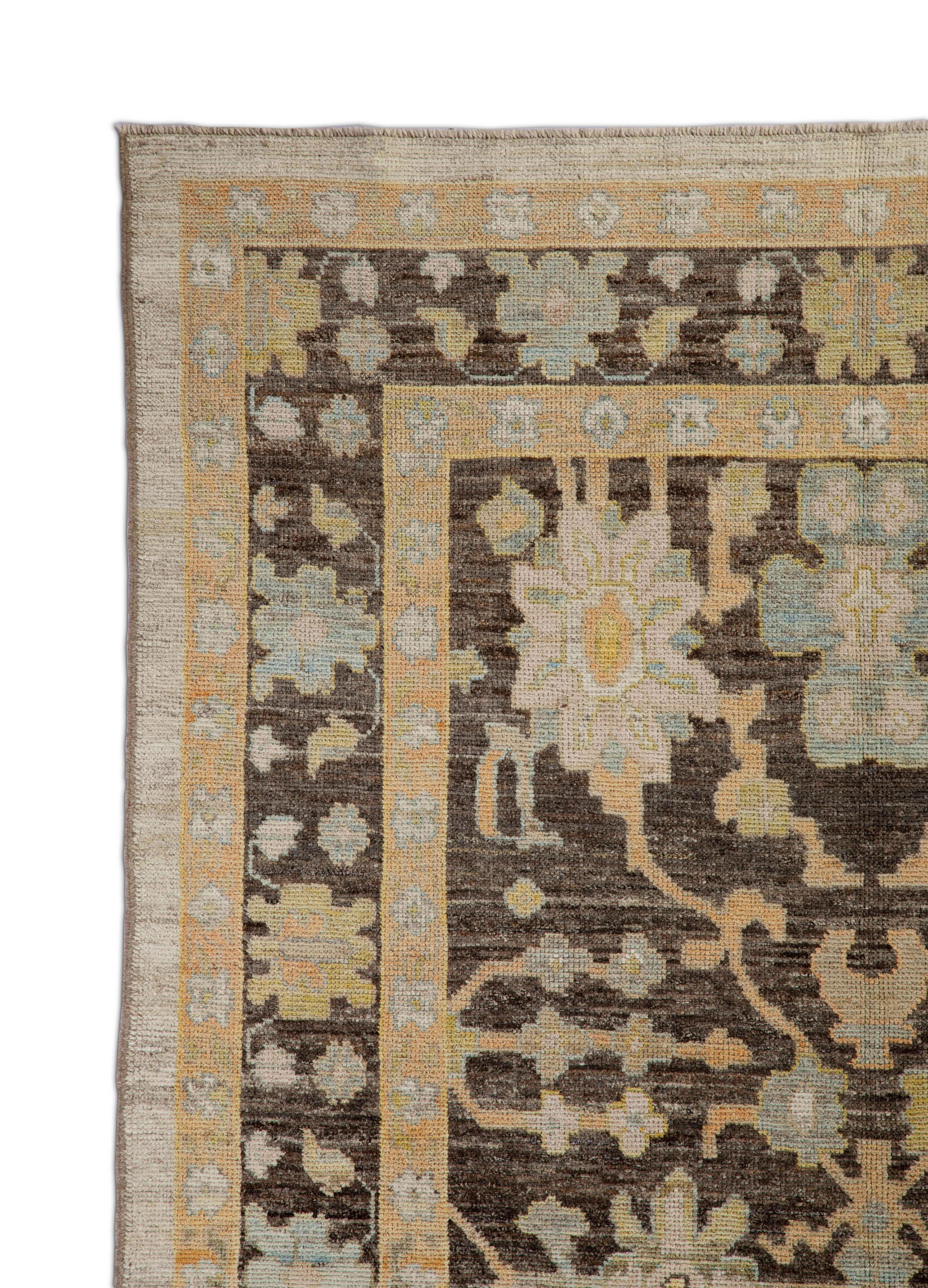 Hand-Woven Contemporary Turkish Oushak Rug with Brown Field and Flower Head Details For Sale