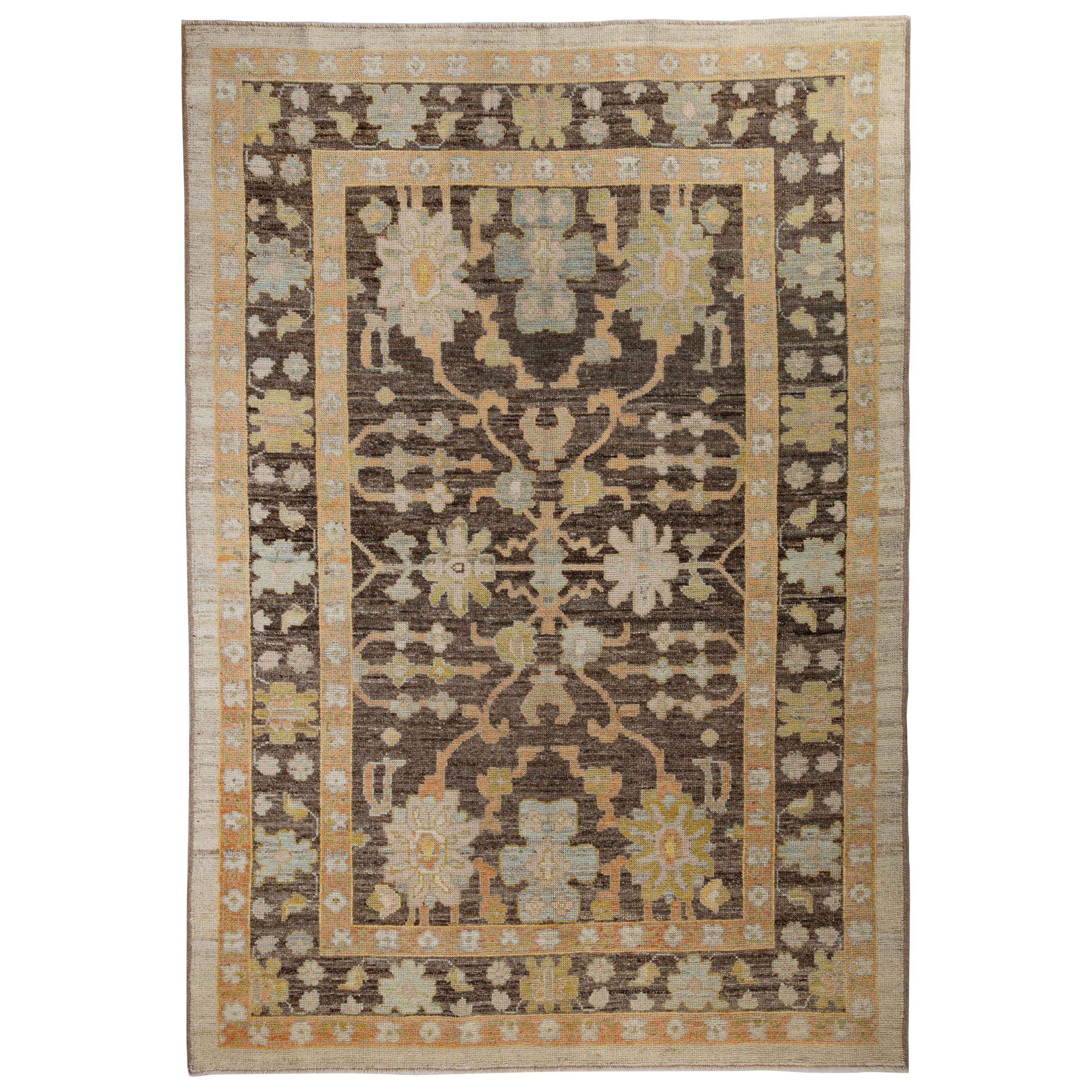 Contemporary Turkish Oushak Rug with Brown Field and Flower Head Details