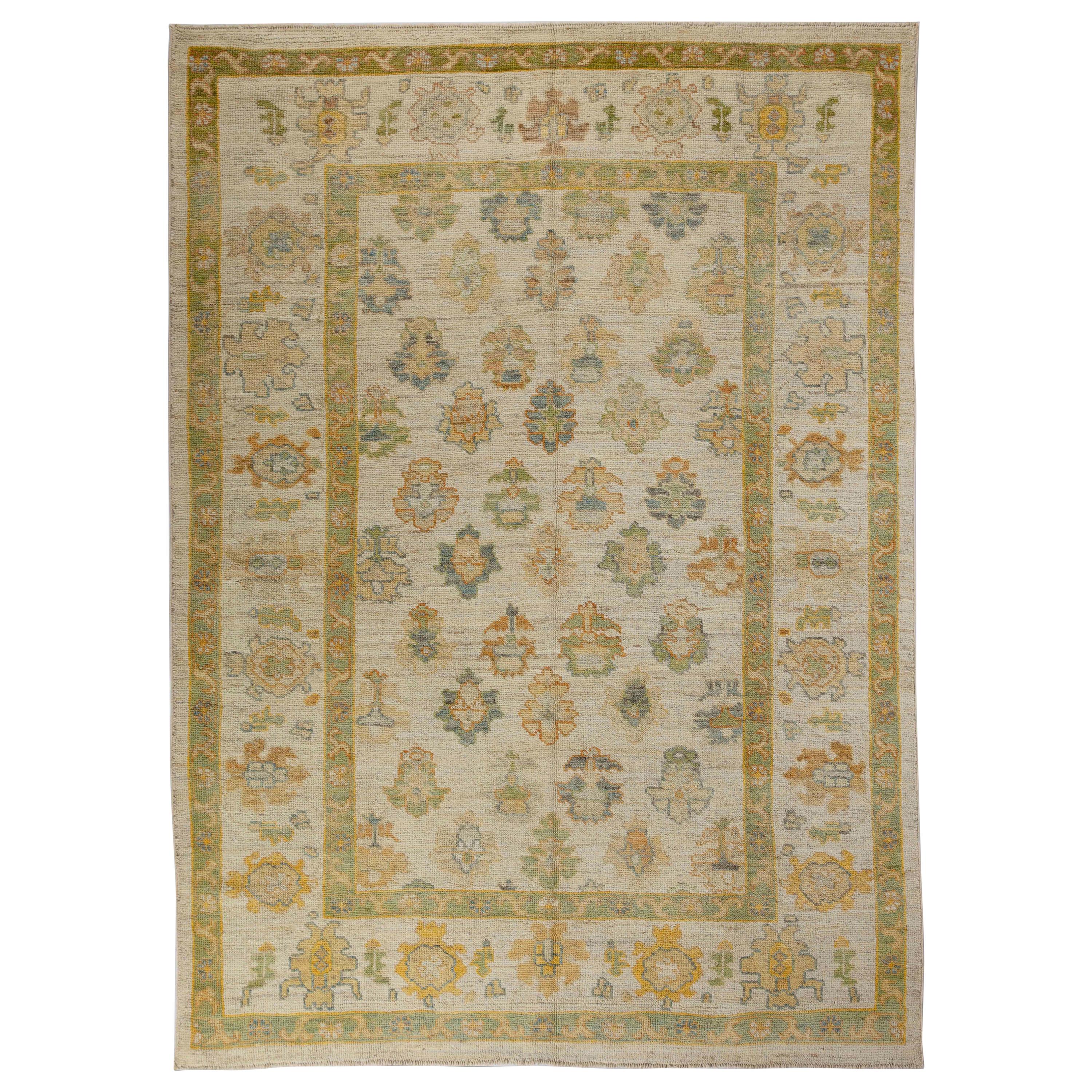 Contemporary Turkish Oushak Rug with Flower Heads Pattern over Beige Field For Sale