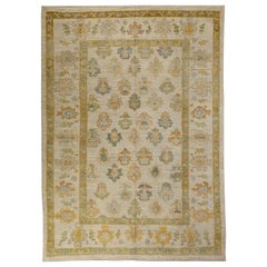 Contemporary Turkish Oushak Rug with Flower Heads Pattern over Beige Field