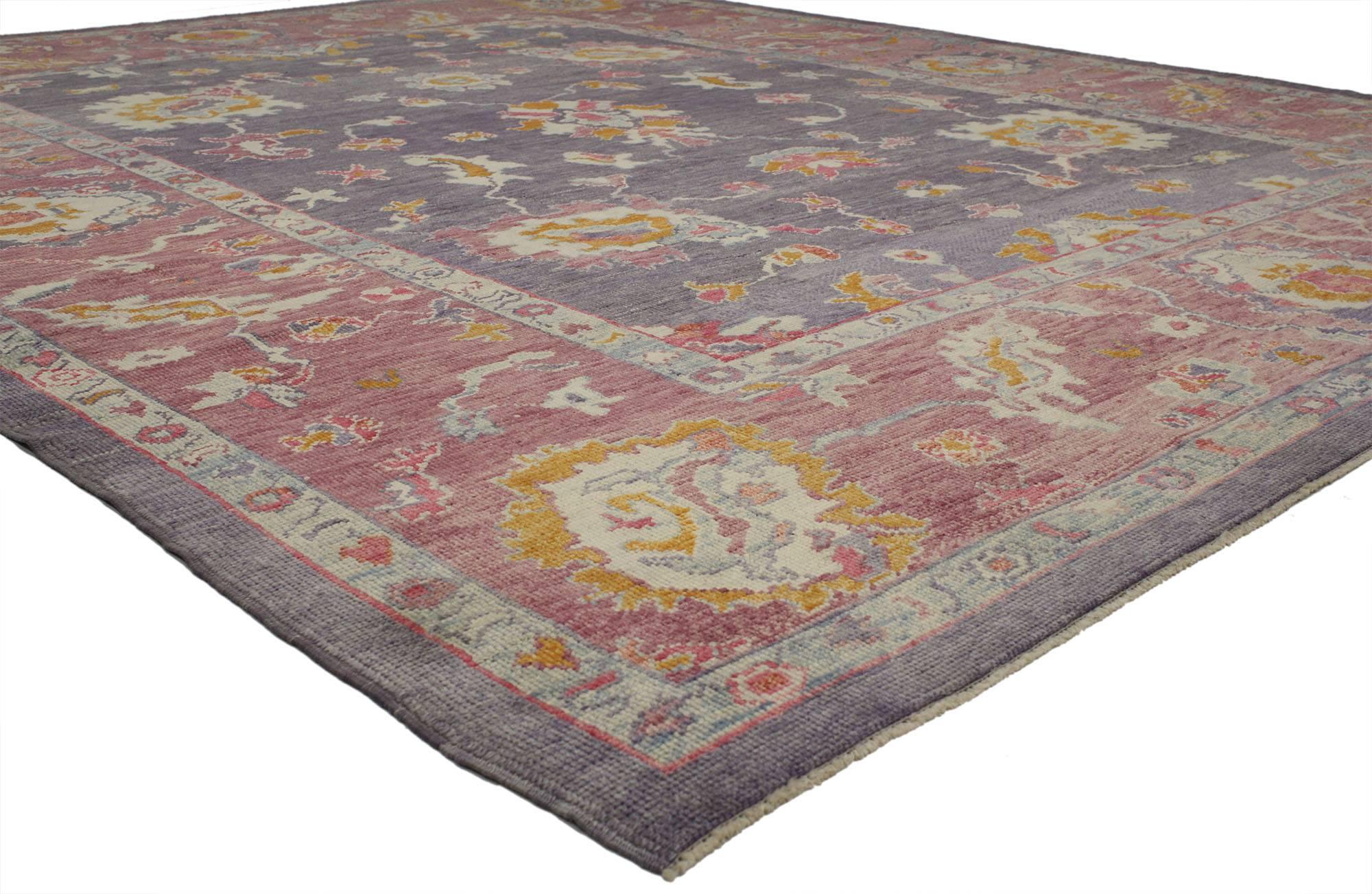 52241 Contemporary Turkish Oushak Rug with Modern Cosmopolitan Style. With a sophisticated palette of pinks and purples combined with a modern cosmopolitan style, this new colorful Turkish Oushak rug is poised to impress. It features an all-over
