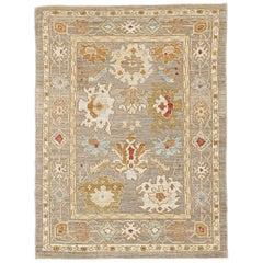 Tapis turc contemporain d'Oushak avec motifs floraux rouges et bruns sur fond gris