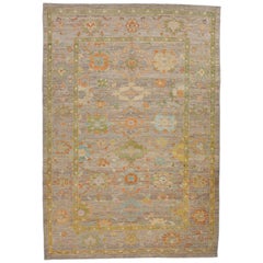 Contemporary Turkish Rug Using Oushak Weaving with Pastel-Colored Flower Details