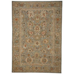 Tapis contemporain Sultanabad avec champ de fleurs colorées bleu et gris