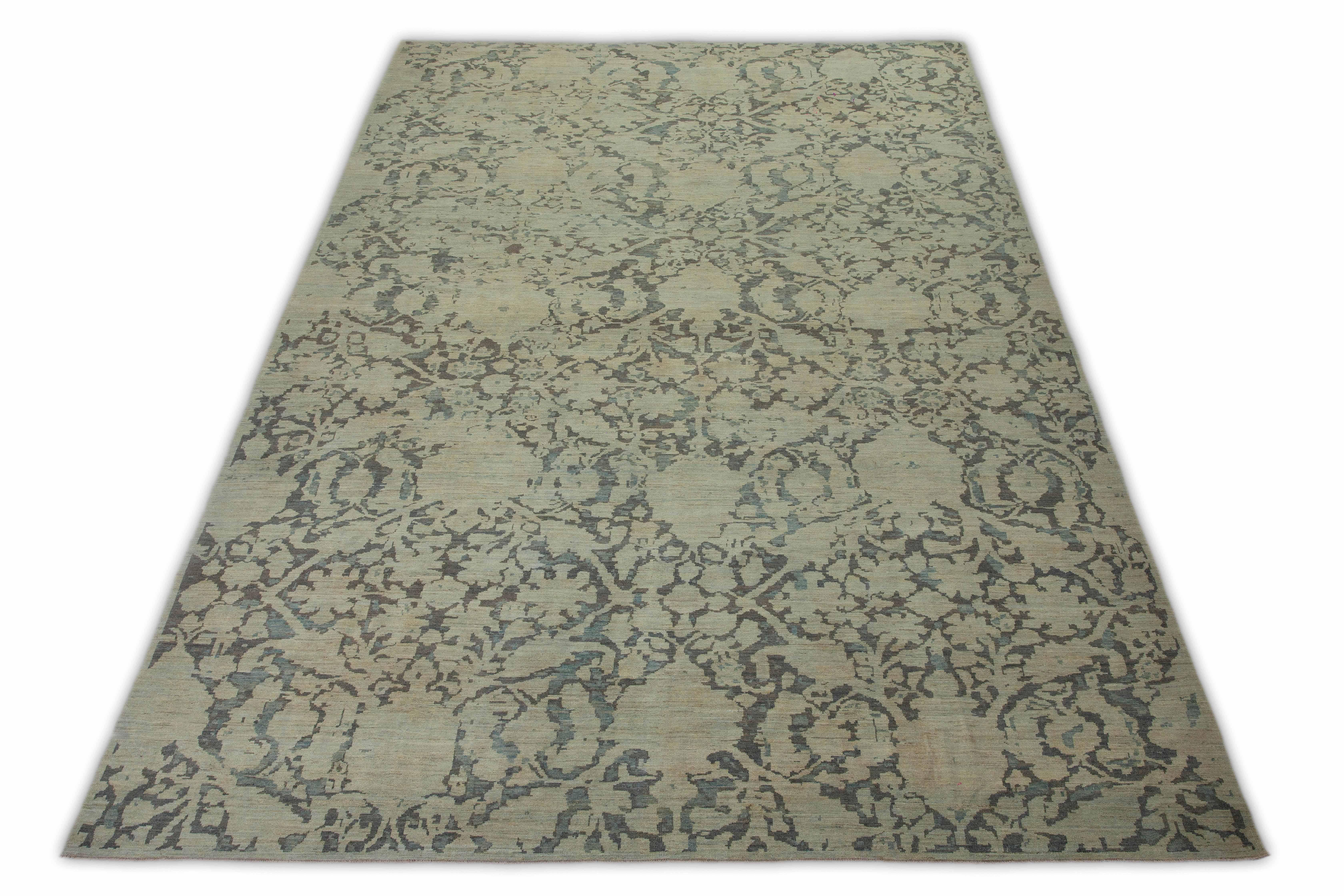 Handmade Turkish area rug from high quality sheep’s wool and colored with eco-friendly vegetable dyes that are proven safe for humans and pets alike. It’s a Classic Sultanabad design showcasing a regal dark hue of gray field with prominent Herati