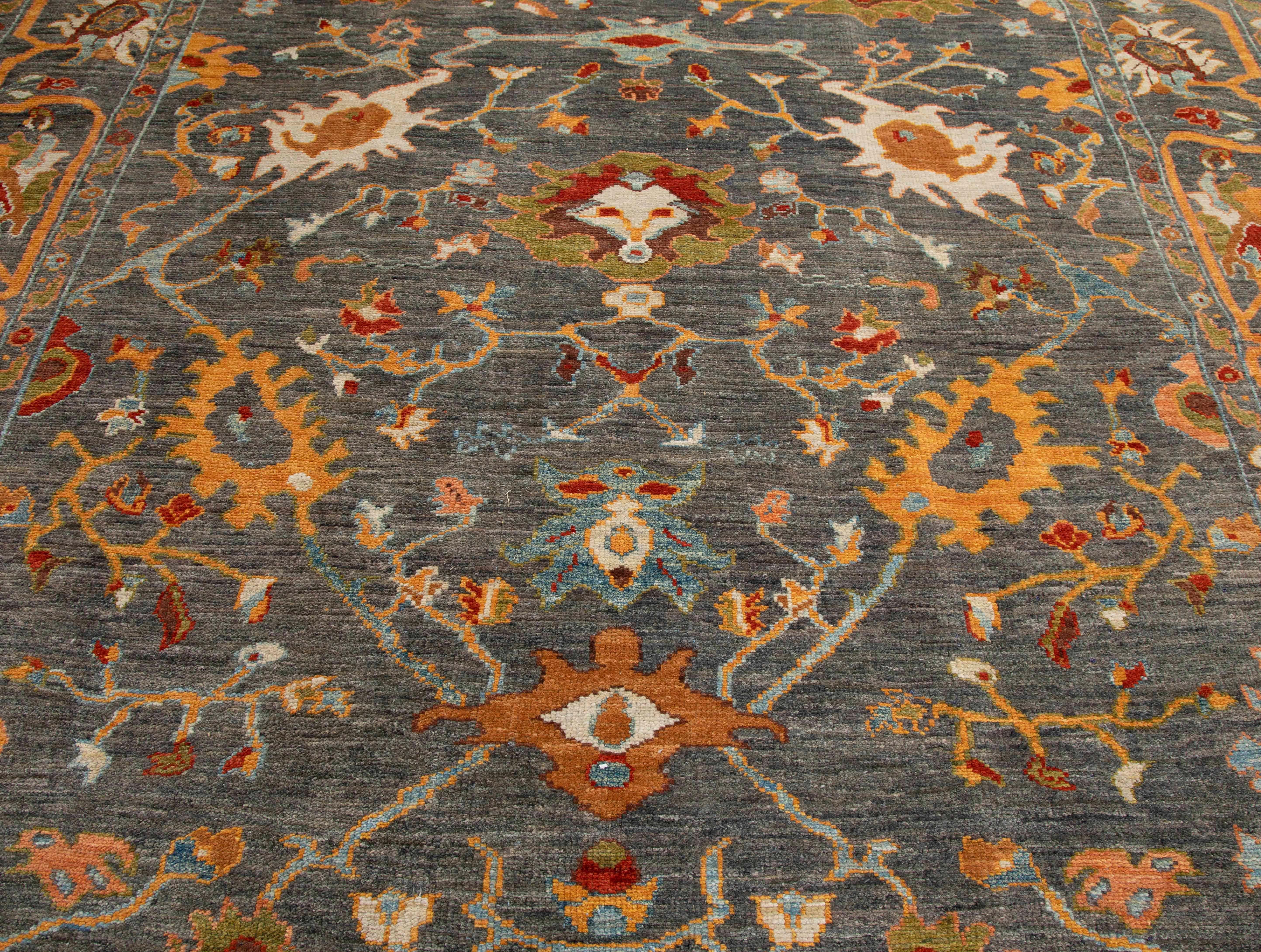 Handmade Turkish area rug from high quality sheep’s wool and colored with eco-friendly vegetable dyes that are proven safe for humans and pets alike. It’s a classic Sultanabad design featuring a regal gray field with a colored mix of Herati flower