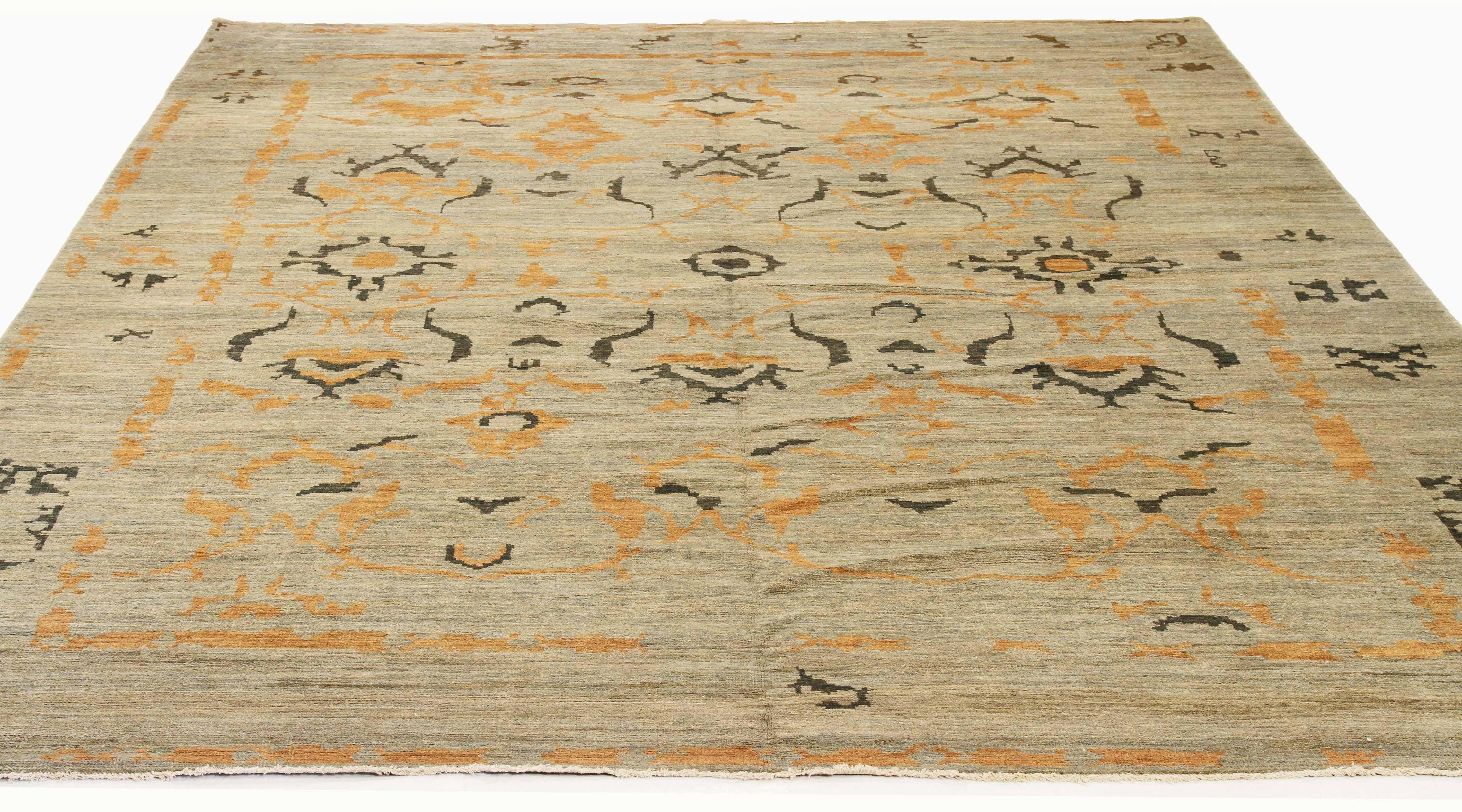 Contemporary handmade Turkish area rug from high-quality sheep’s wool and colored with eco-friendly vegetable dyes that are proven safe for humans and pets alike. It’s a Classic Sultanabad design showcasing a regal beige field with prominent Herati