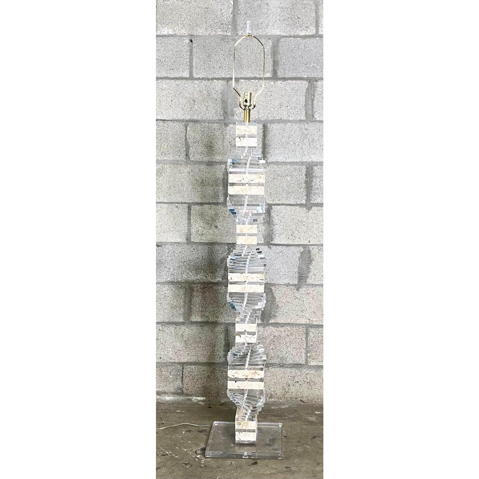 Exceptional contemporary floor lamp. Gorgeous stacked lucite and coquina stone in a twisted design. A really striking profile. Acquired from a Palm Beach estate.
