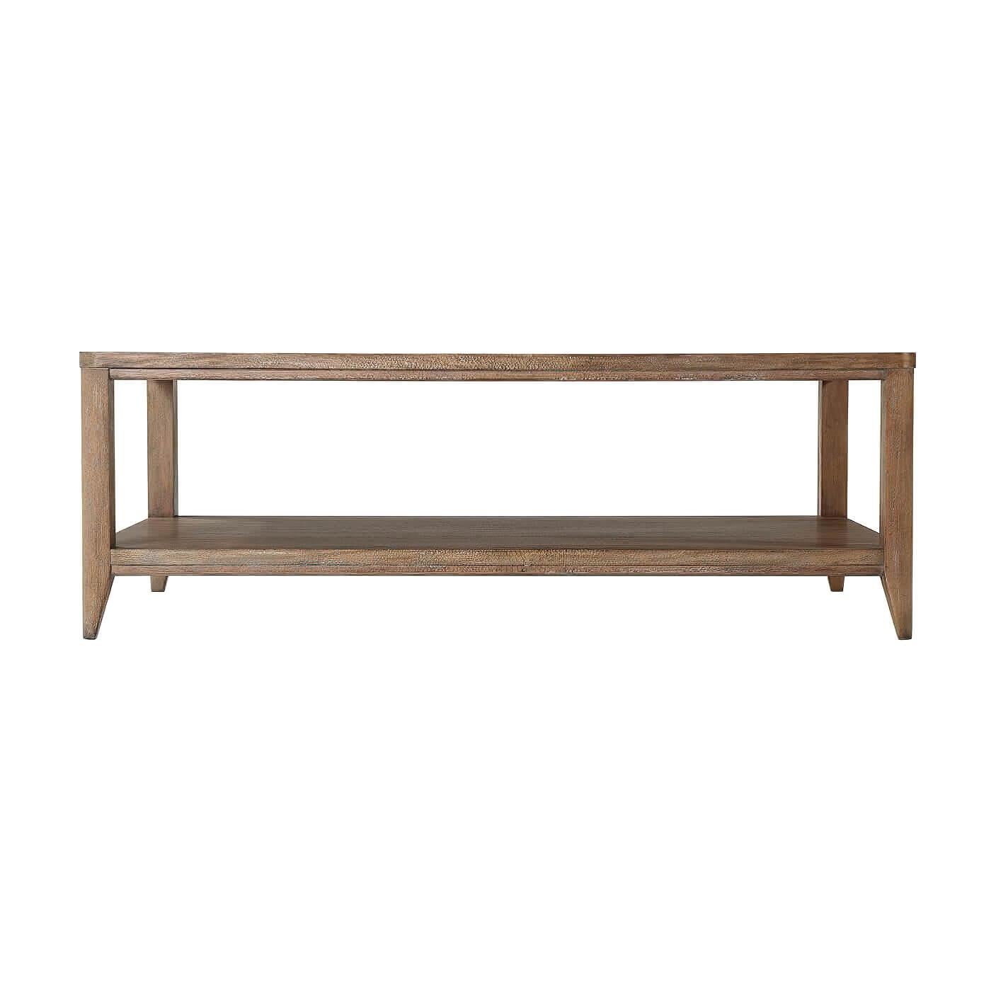 A contemporary two-tier coffee table crafted with Primavera veneer and beech in Mangrove finish. 

Dimensions
54