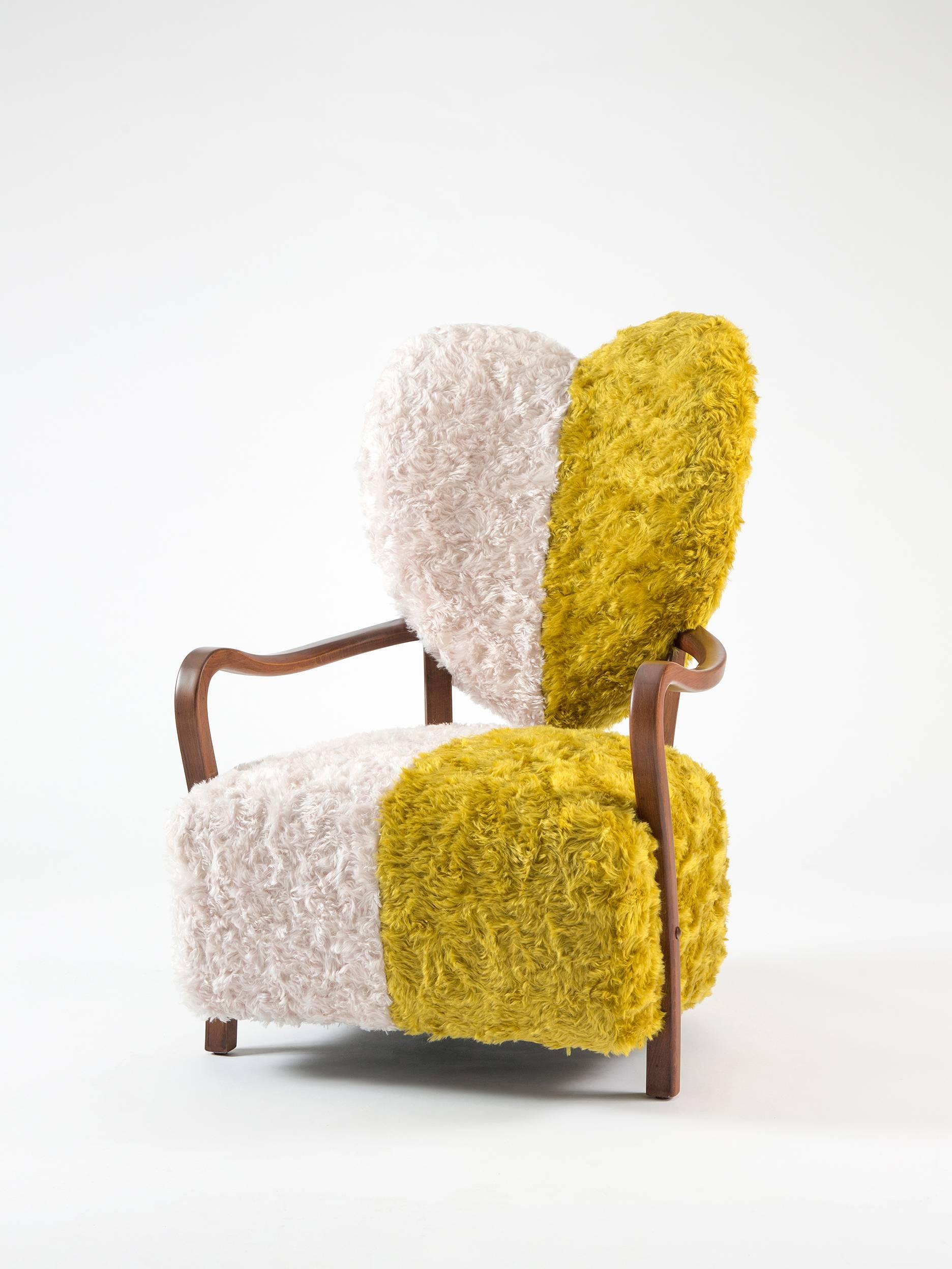 Dedicated to all the broken hearts, Uni represents both separation and unification of souls. Contrasting of yellow and white reflect the differences between any two living things and the beauty of their combination. 

Uni is upholstered with %100