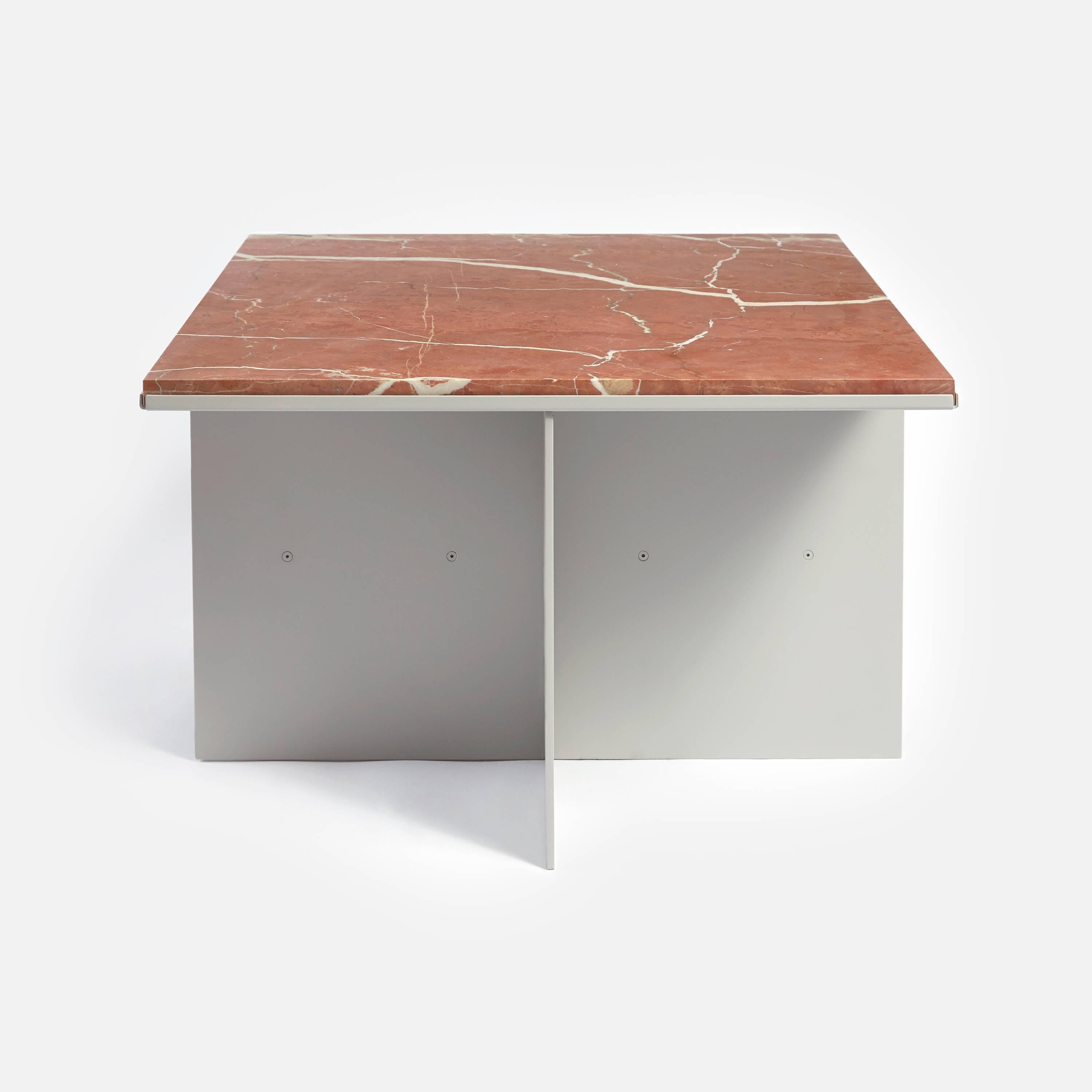 Other kingdom's uniform tables complement the natural warmth of a marble top with a precisely formed metal base that is fabricated in powder coated aluminium.

The marble top is available in solid marble or with an inlaid grid pattern similar to our