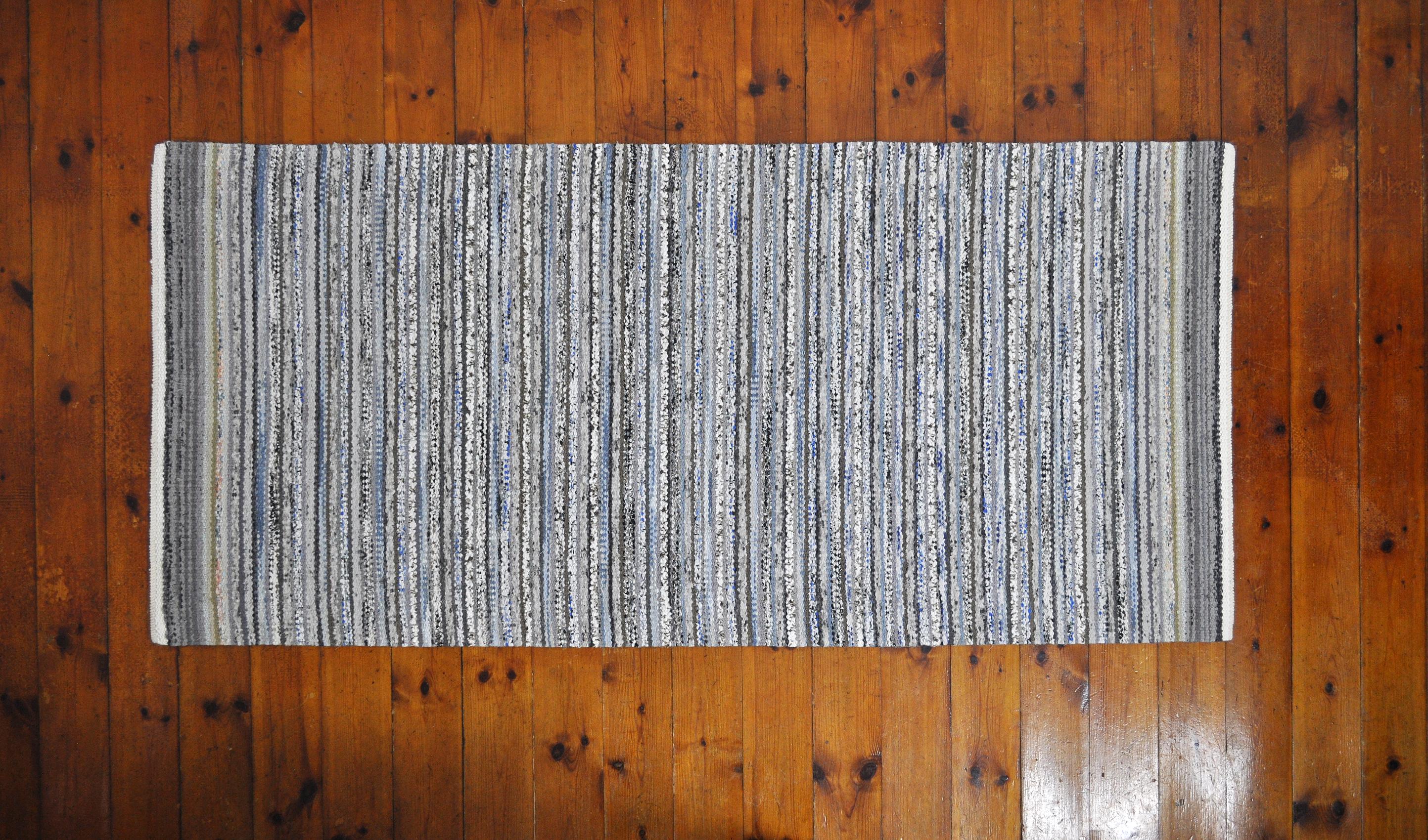 Unique Danish rug in recycled colored materials. Handwoven in the traditions of Scandinavian rugs. High quality craftsmanship by MB handwoven rugs. Can be washed without loosing color or shape.