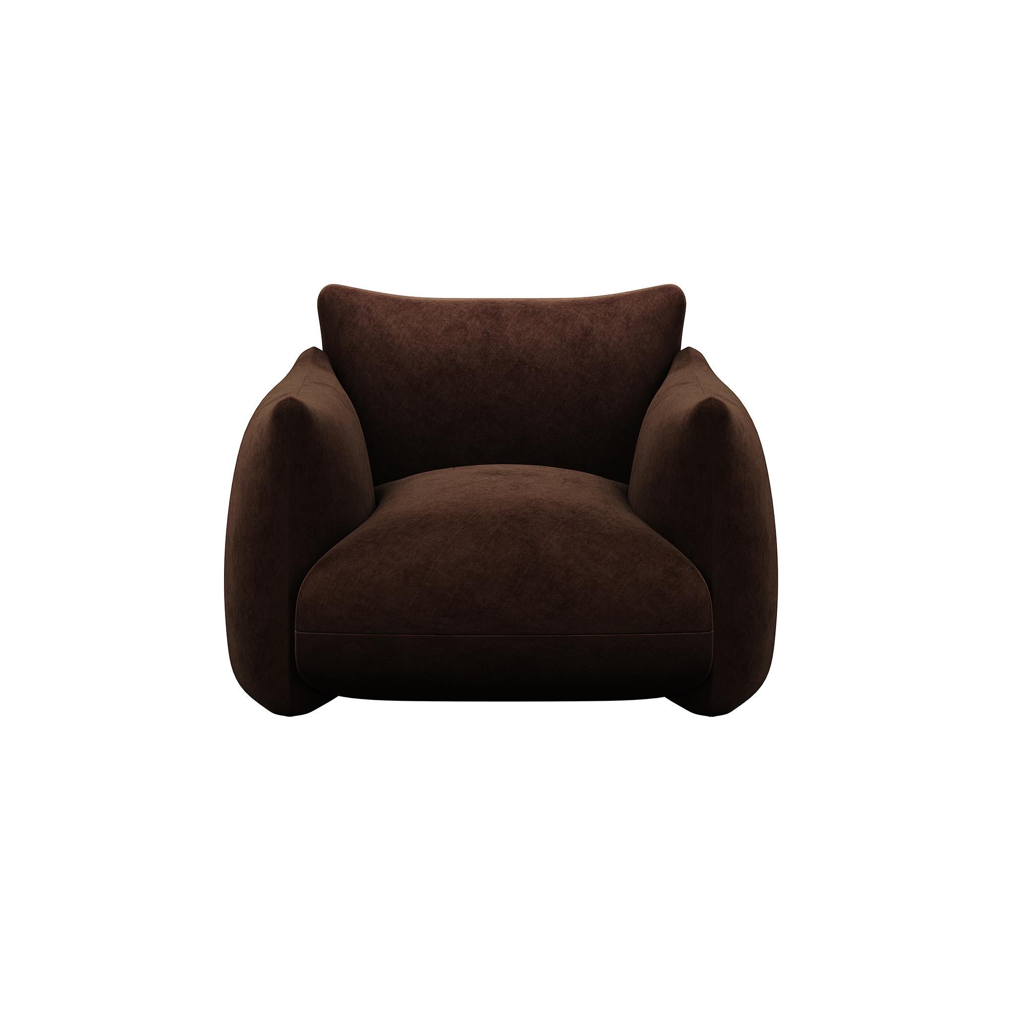 Introducing the epitome of comfort and style – the Full Upholstery Armchair in sumptuous Chocolate Suede.
This armchair is a harmonious fusion of luxurious design and irresistible coziness, making it the perfect addition to any sophisticated