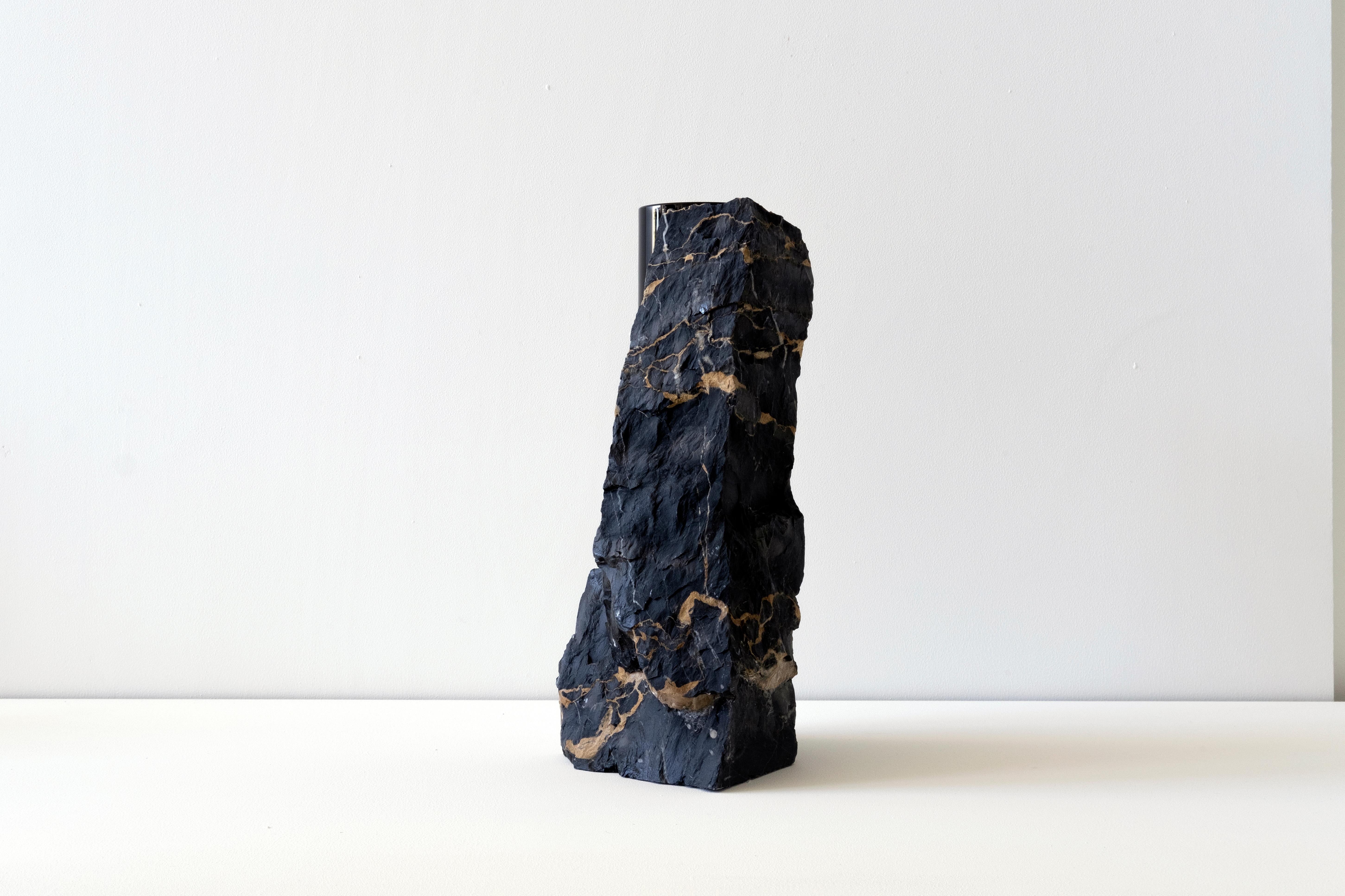 Drill vases

Part chaos and part control, drill vases are an exercise in
improvisation.  

The origin of the project lies in Carrara, and the small fragments of
marble found discarded by quarries in the region. I began to collect
these