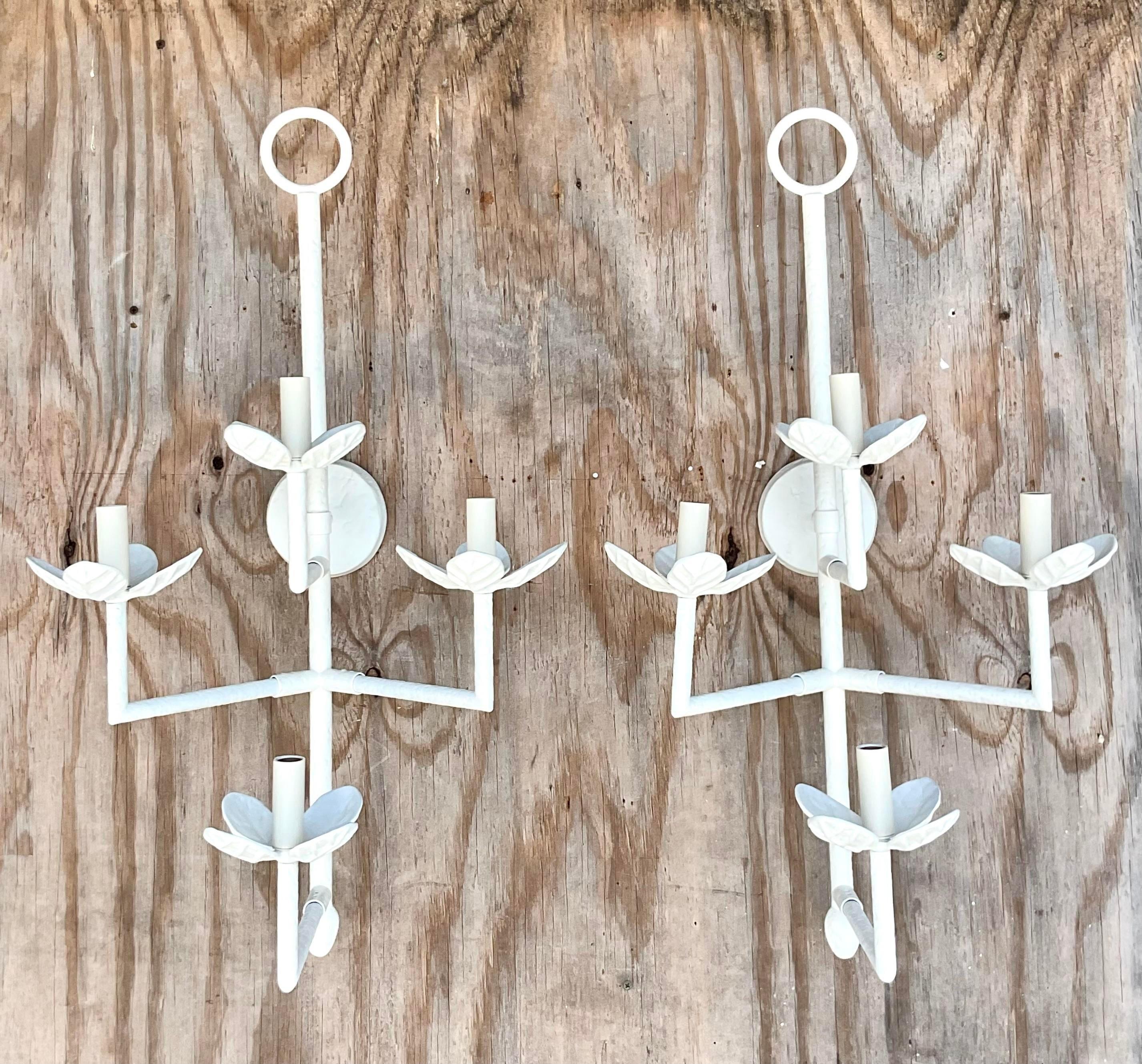 A fabulous pair of Vaughan Lighting wall sconces. Brand new and never installed. The iconic “Haldon” style with a textured chalk white finish. Acquired from a Palm Beach estate.