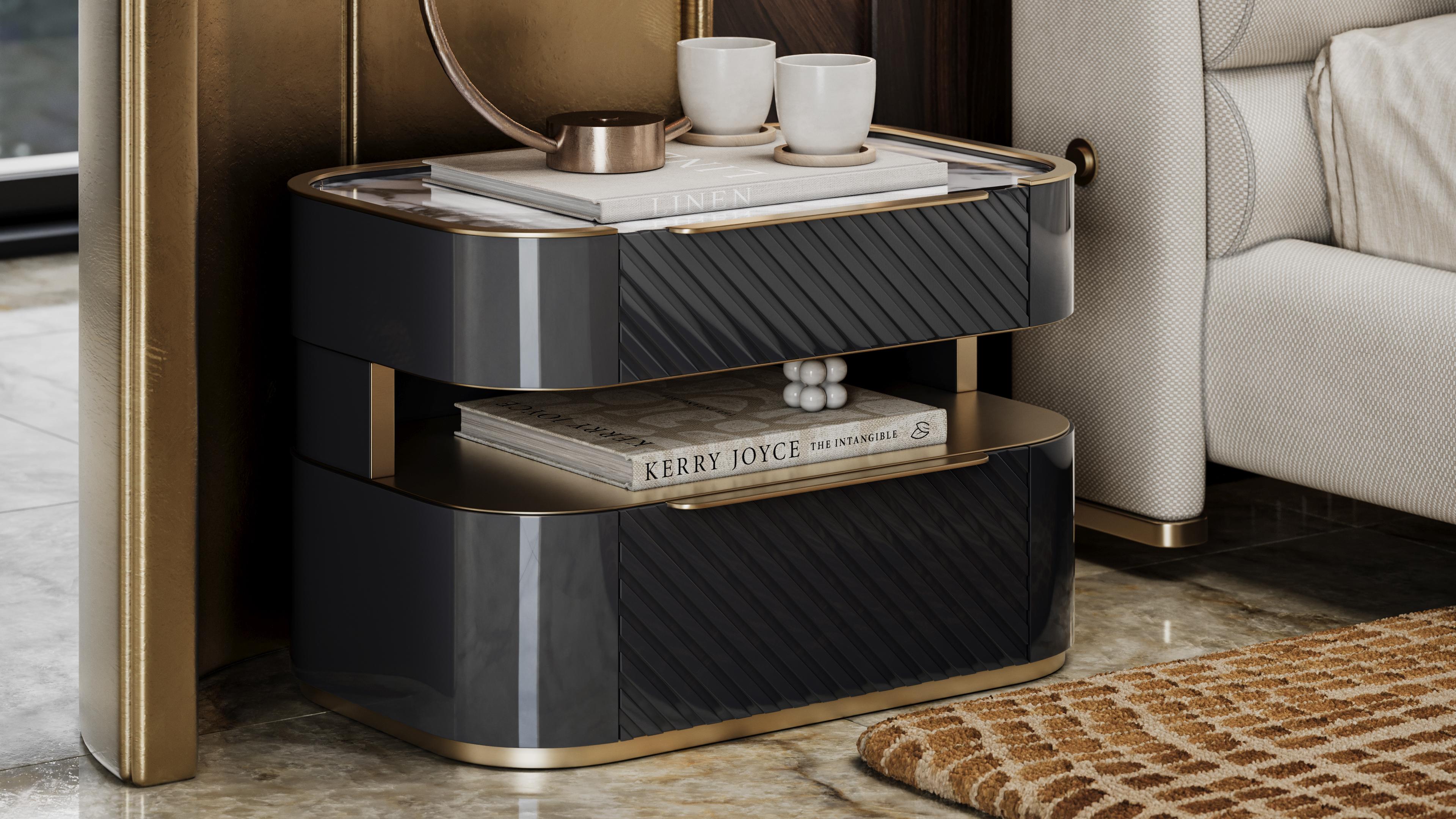A lacquered bedside table with 3D-relief doors, adding texture and visual interest. The brushed brass details and handles complement the modern design, enhancing its sophisticated look. The marble top adds a luxurious touch, while the open center