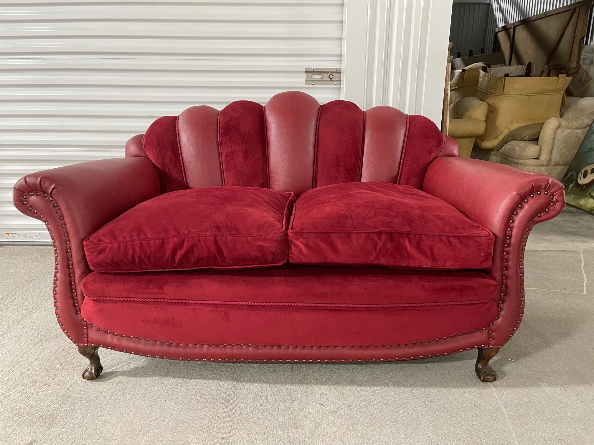 Contemporary velvet and leather sofa, 20th Century. Seat height is 23.5