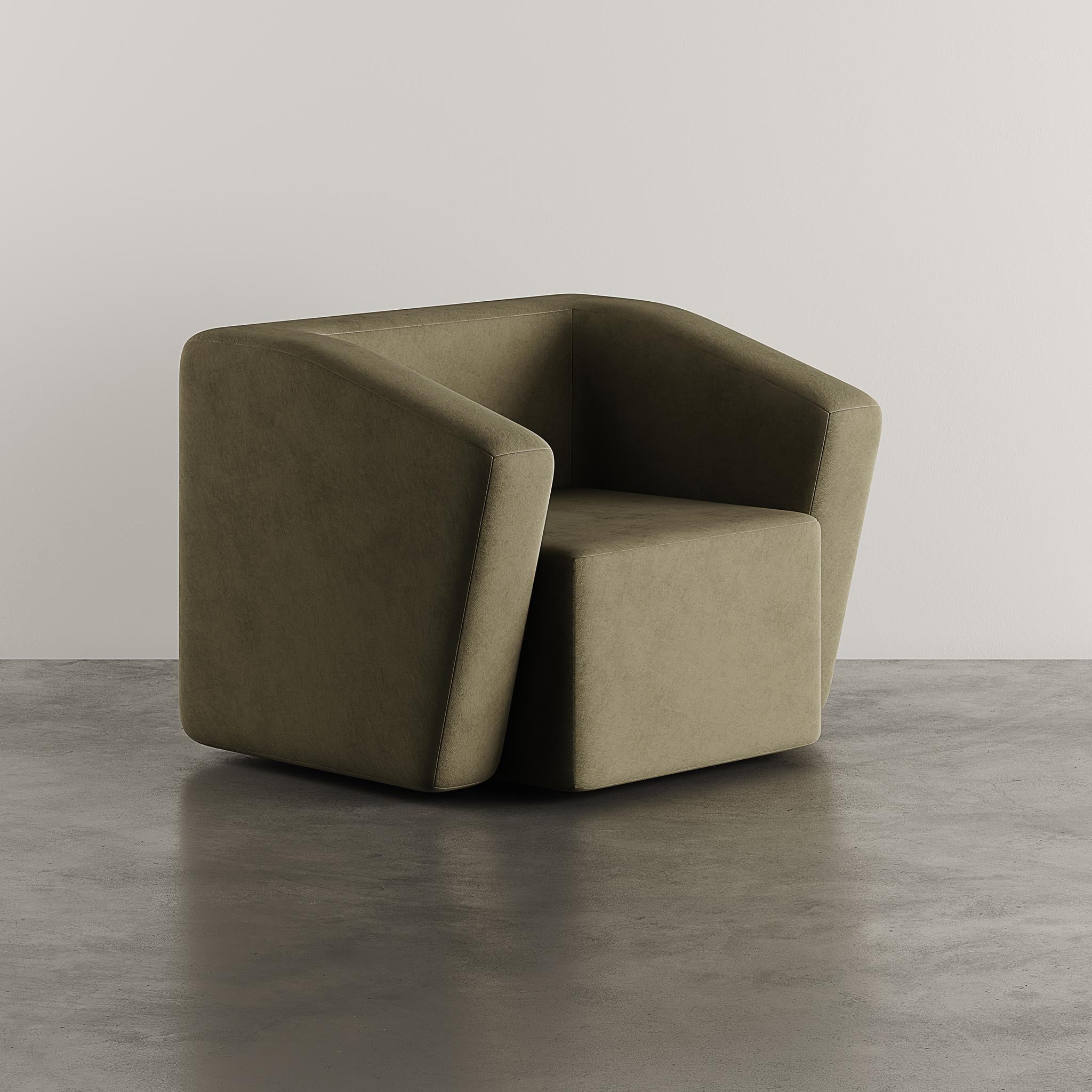Introducing the Kobe Armchair in a luxurious green suede finish – a perfect blend of sophistication and comfort.
This elegant armchair boasts a sleek design that seamlessly merges modern aesthetics with timeless style.
The lush green suede