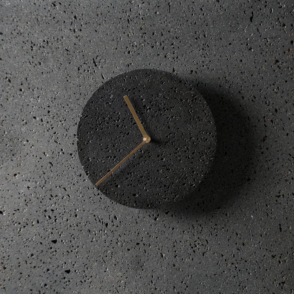 Wall clock 'Moment' by Buzao x Bentu design.

Black lava stone

Measure: Diameter 24cm.