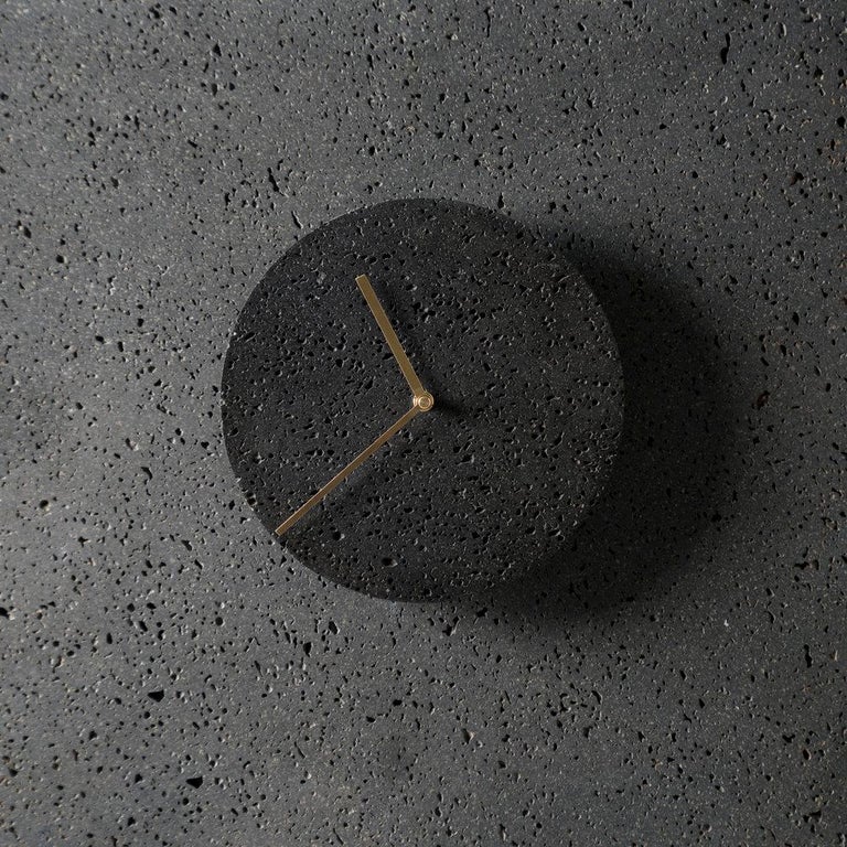 Wall clock 'Moment' by Buzao x Bentu design.

Black lava stone

Measure: Diameter 24cm.