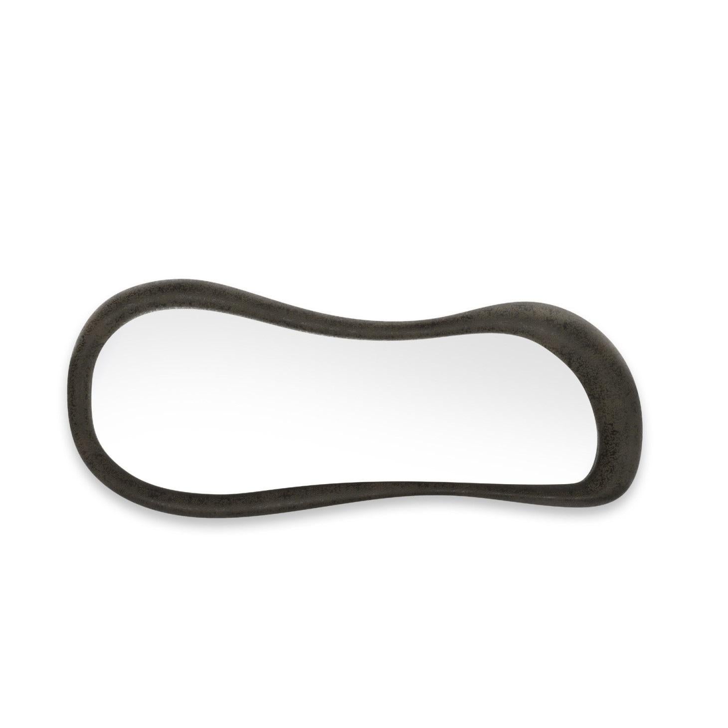 Introducing this wall mirror, a striking declaration of elegance and refinement for your environment. Its expansive dimensions, sinuous contours, and volcanic finish radiate contemporary allure and sophistication. Meticulously crafted with