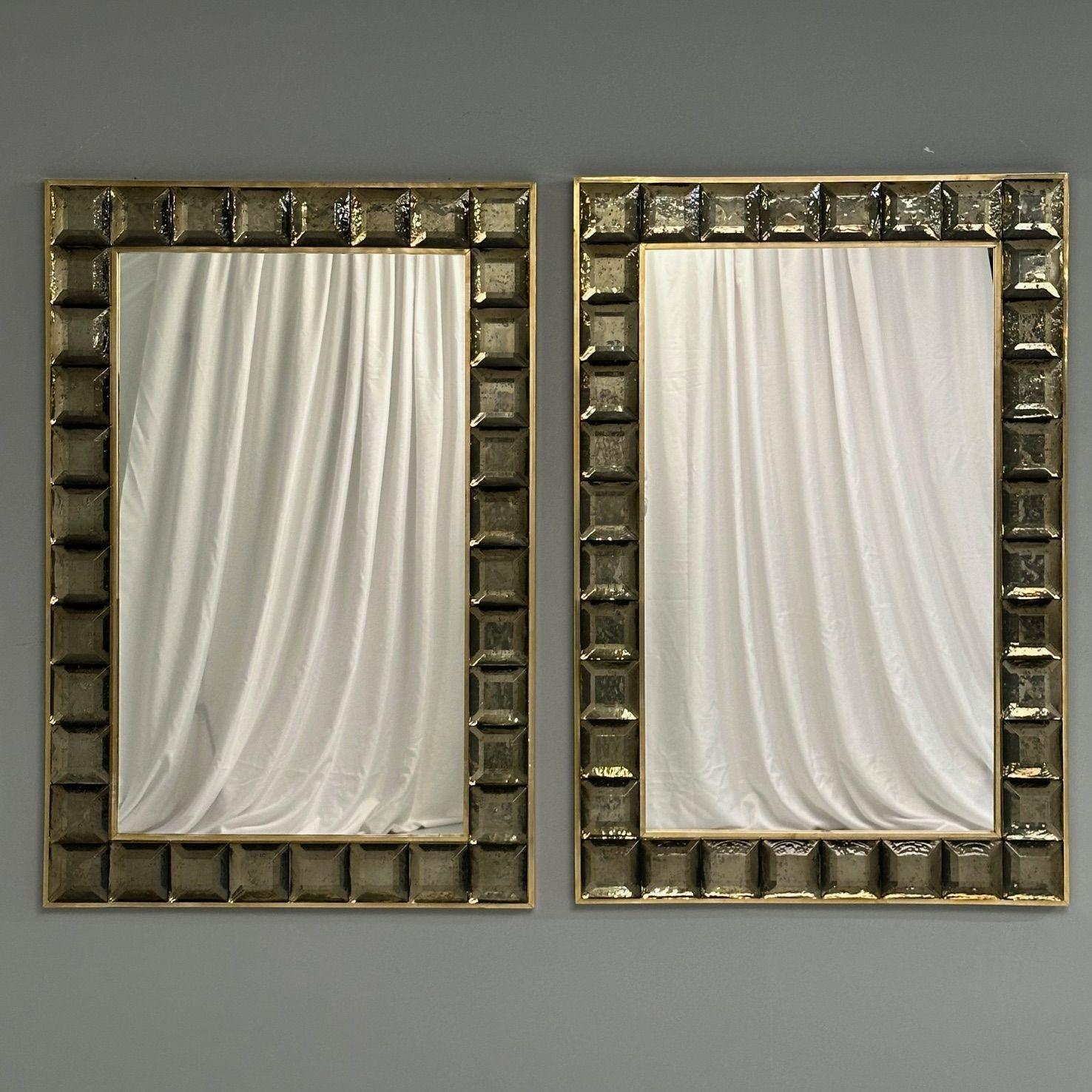 Contemporary, Wall Mirrors, Bronze Faceted Square Murano Glass, Brass, Italy, 2023

Pair of rectangular wall mirrors designed and produced in Italy. Each mirror has a light bronze color diamond cut squares along the frame as well as holes on the