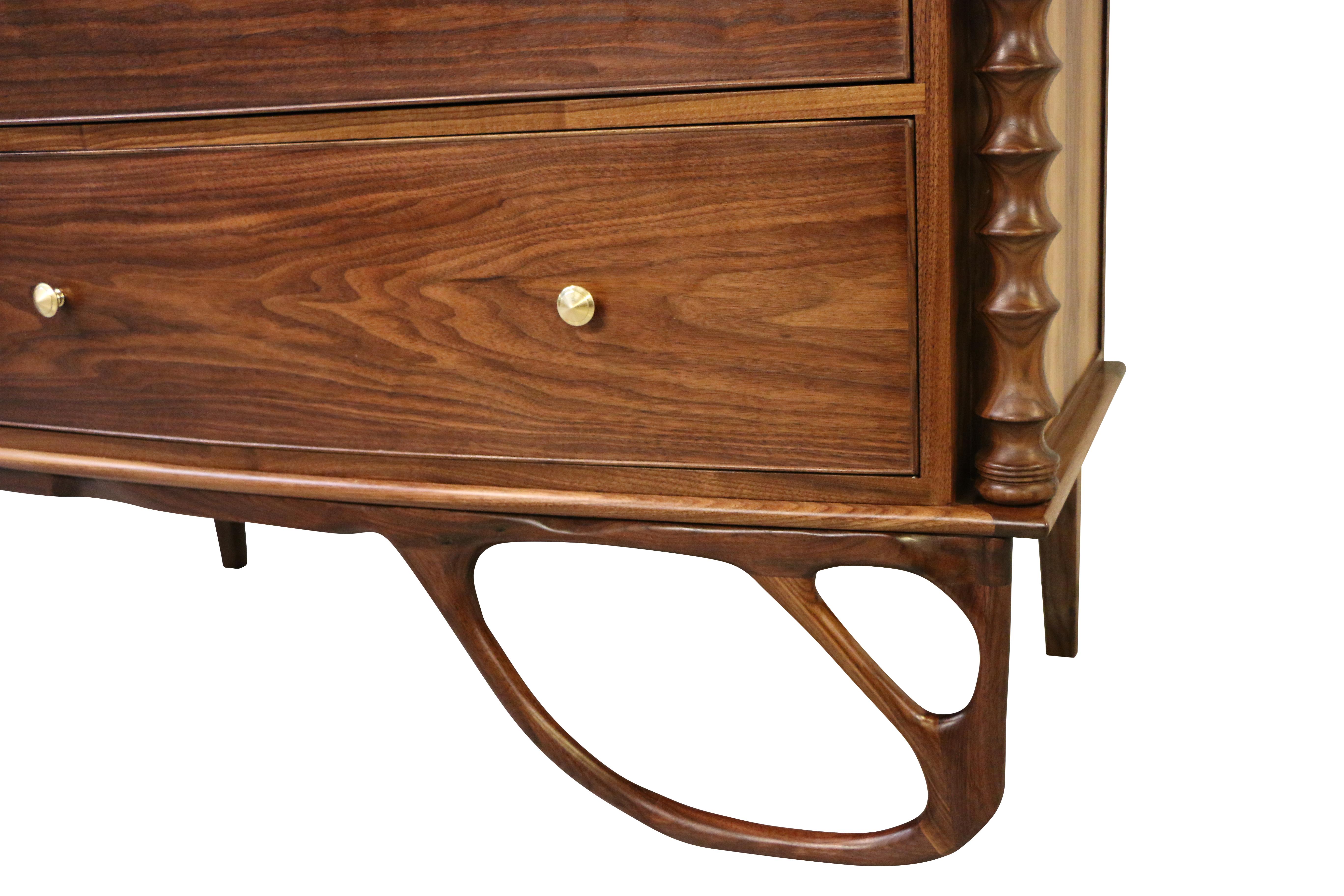 American Contemporary Walnut Dresser With Sculpted Right Leg & Brass Hardware For Sale